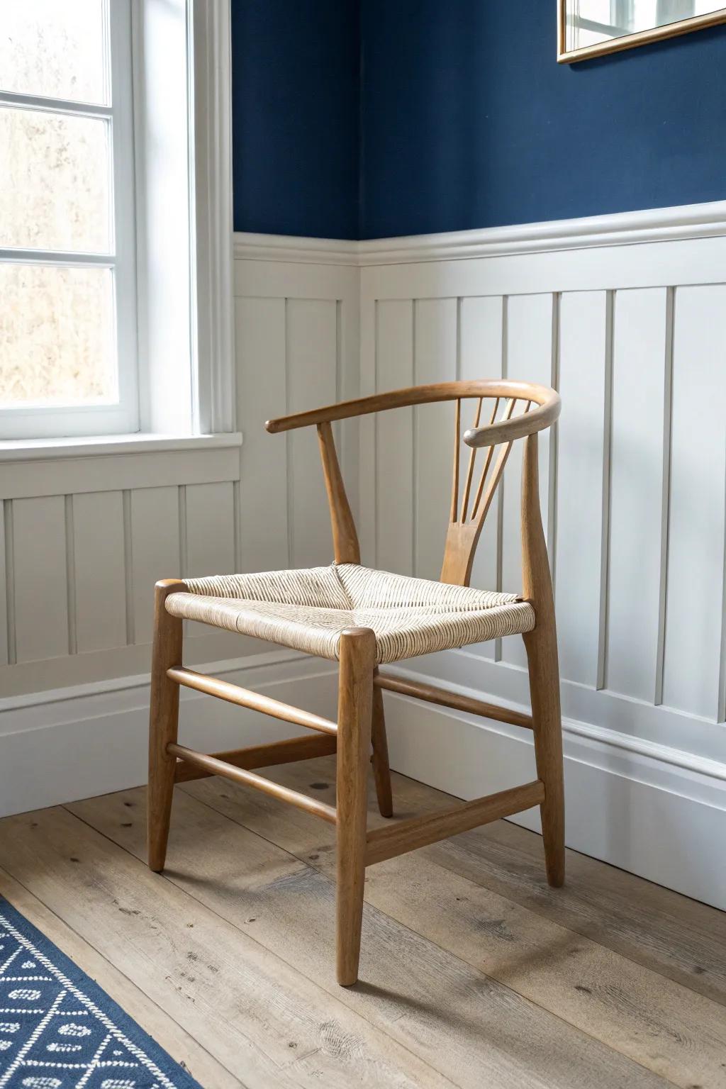 Classic navy wainscoting + bright white walls for a crisp, timeless contrast that elevates any nook.