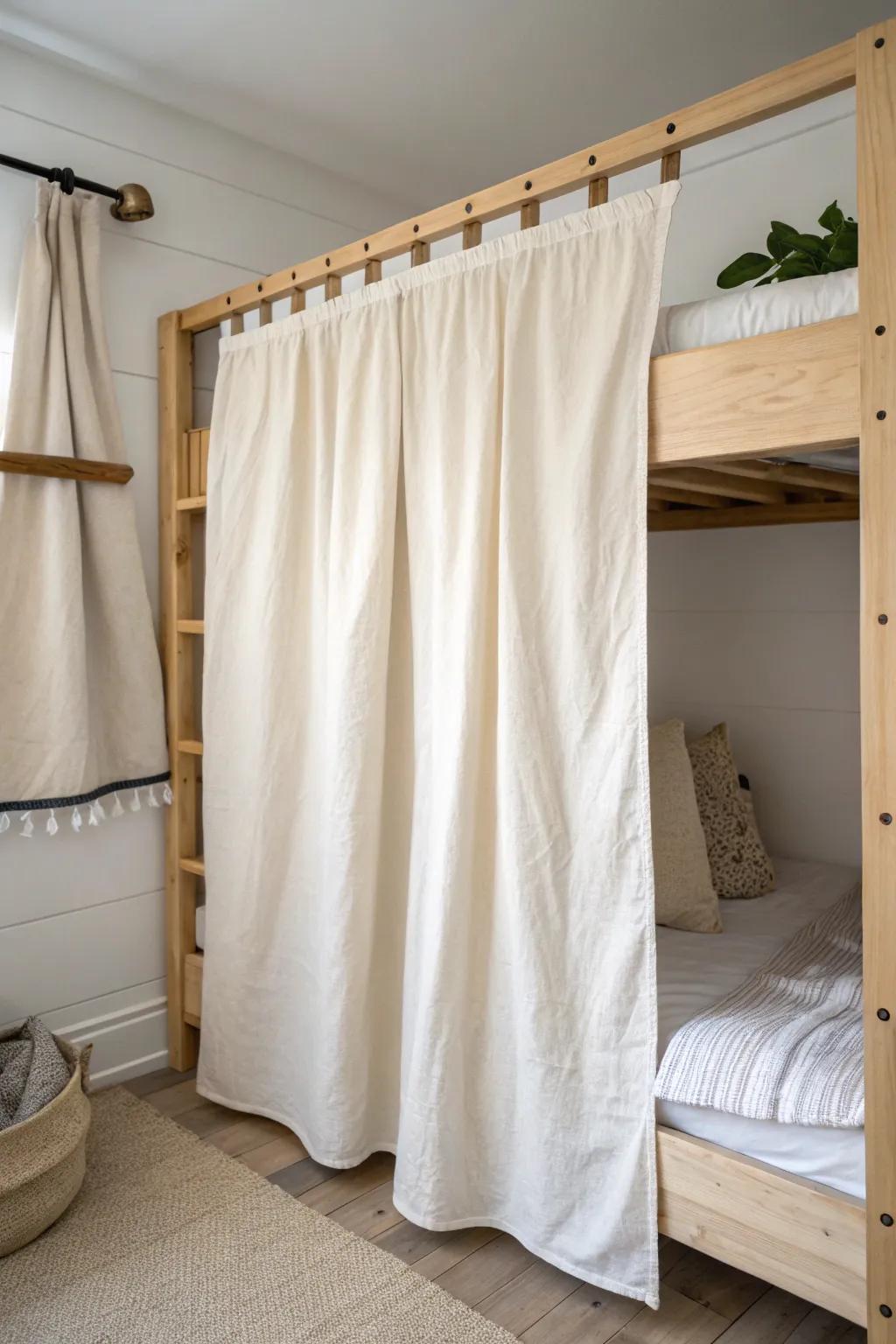 A no-sew sheet curtain fort: clip rings on a tension rod for an instant cozy bunk hideaway.
