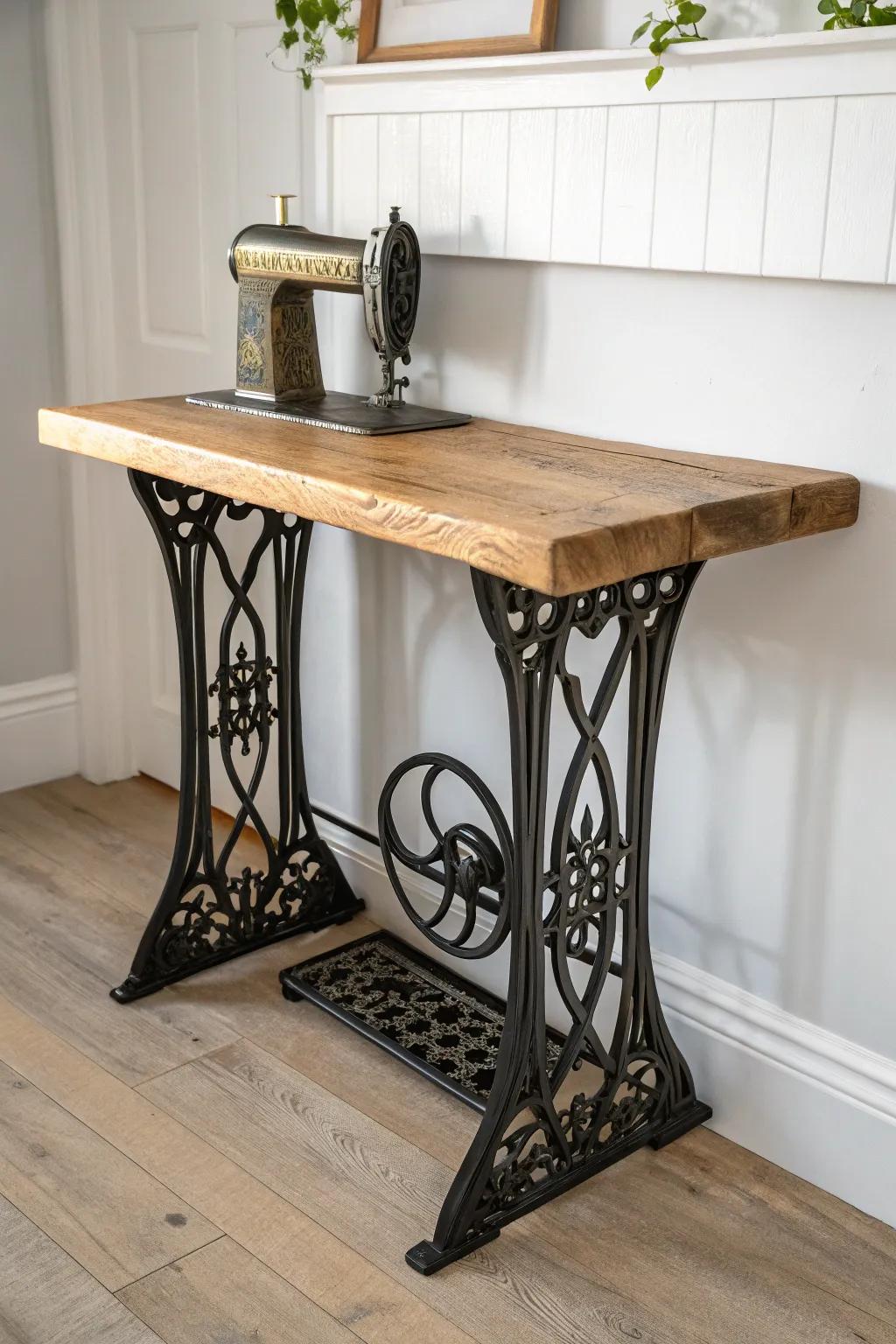 Old sewing machine base console with reclaimed wood top—entryway charm, storage, and style.