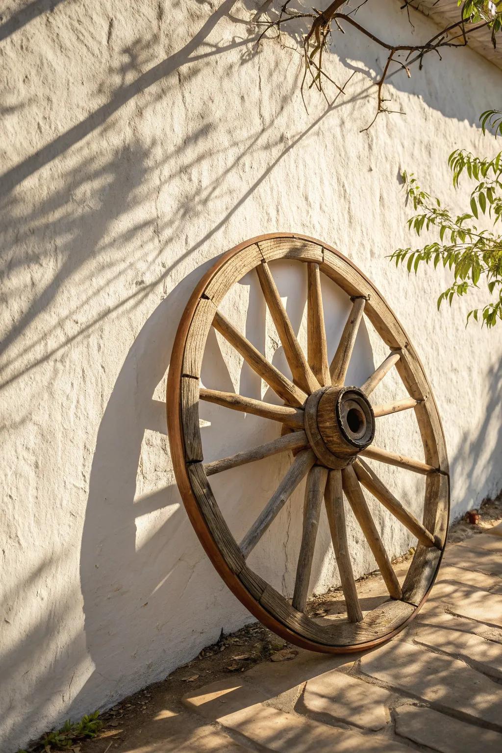 A restored wagon wheel turns blank walls into rustic, minimalist statement art with warm grain.