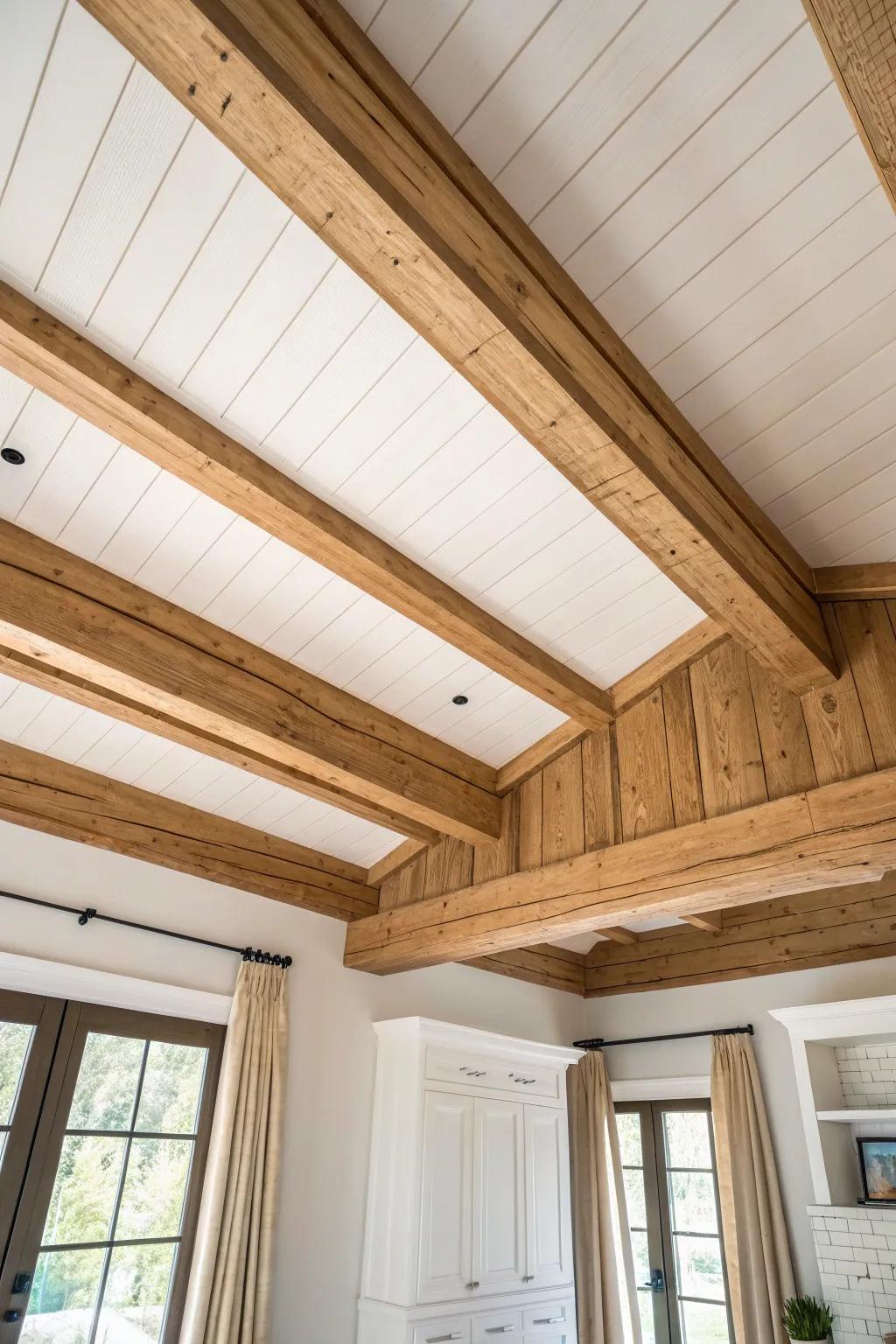 Warm oak beams with crisp white shiplap—an easy way to zone a cozy family room.