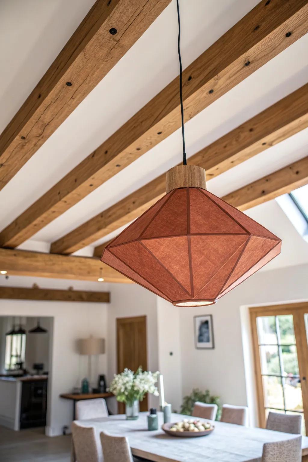 A bold pendant perfectly centered in a box‑beam bay—simple, crafted, and unforgettable.