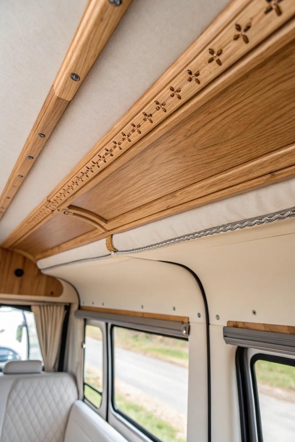A slim wood crown strip hides campervan ceiling cables—clean, minimal, and easy to access.