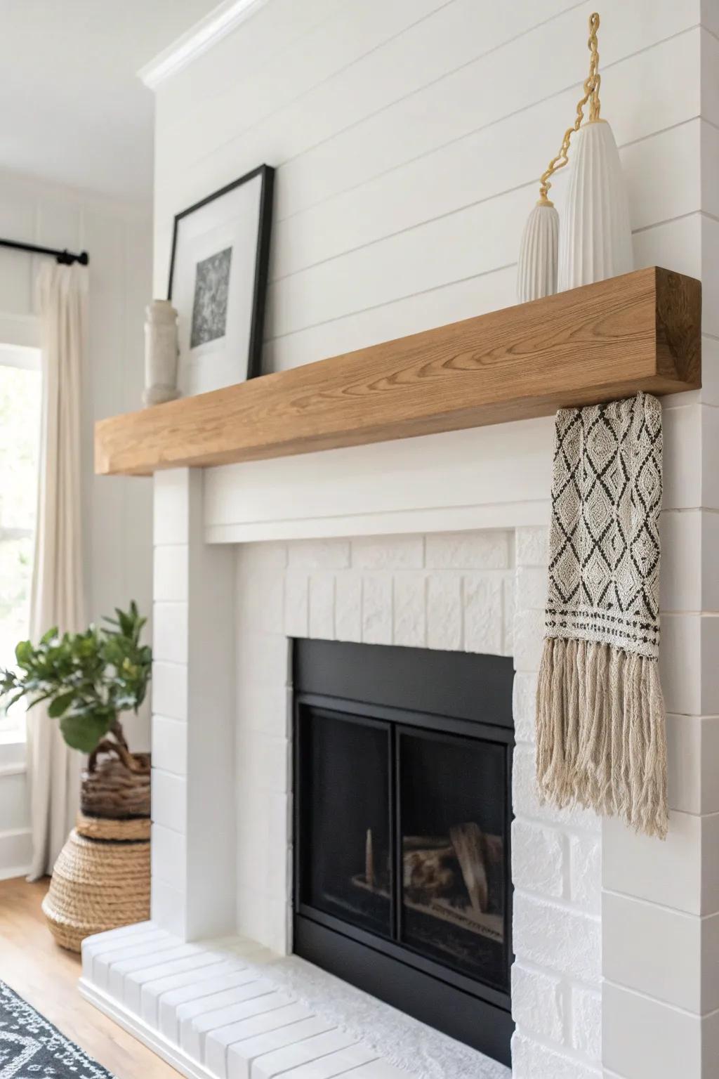 A deep charcoal color-block under a light oak mantel makes the shelf look like it’s floating.