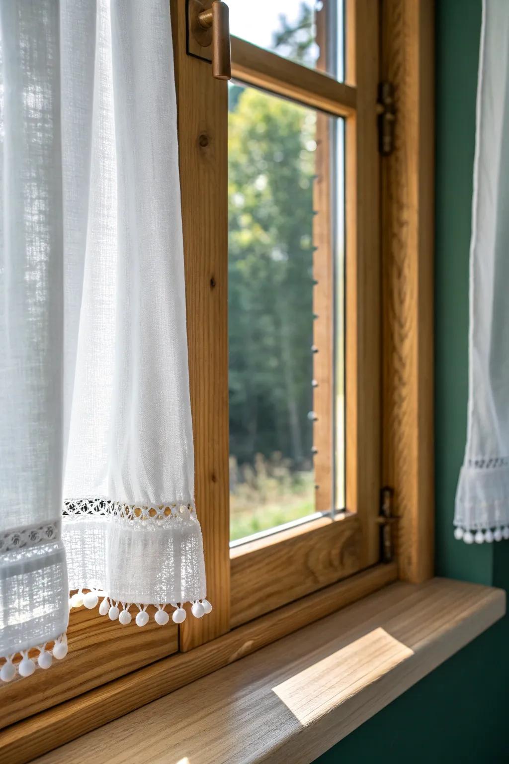 Light linen café curtains on a handcrafted oak window frame—soft, sunlit, and cozy today.