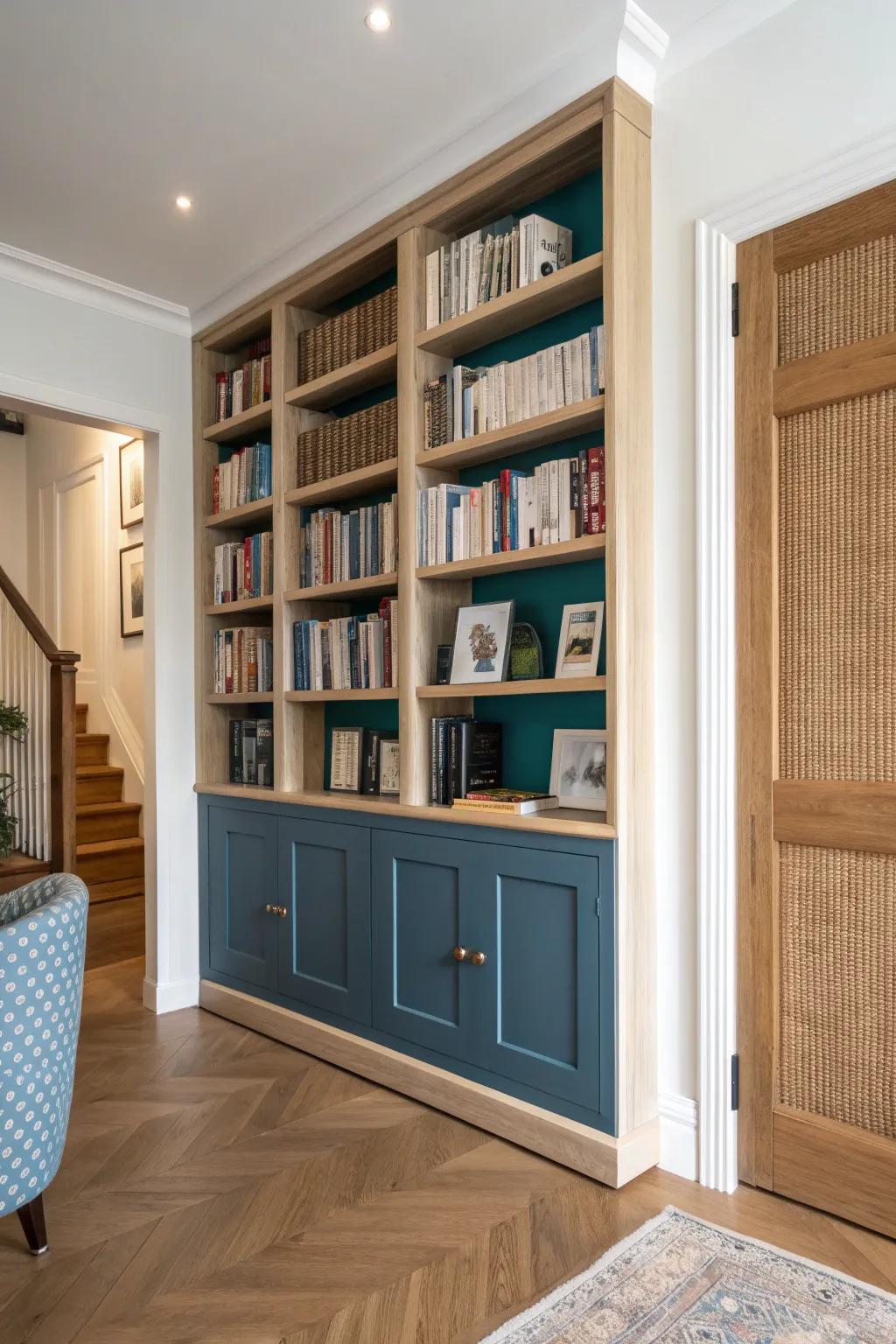Make a doorway alcove look intentional with a bold-backed built-in library in warm oak.