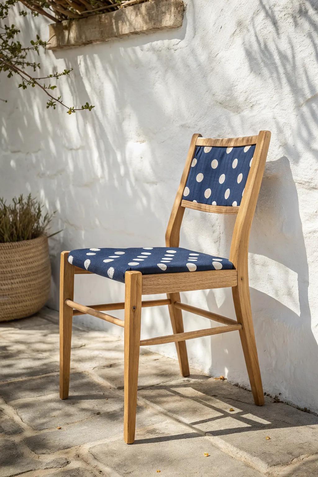 Polka dots only on the seat: one bold surprise zone that makes a simple chair feel playful.