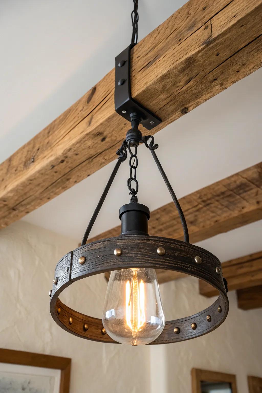 Rustic pendant strapped to an exposed beam—wrought iron details meet warm, modern minimalism.