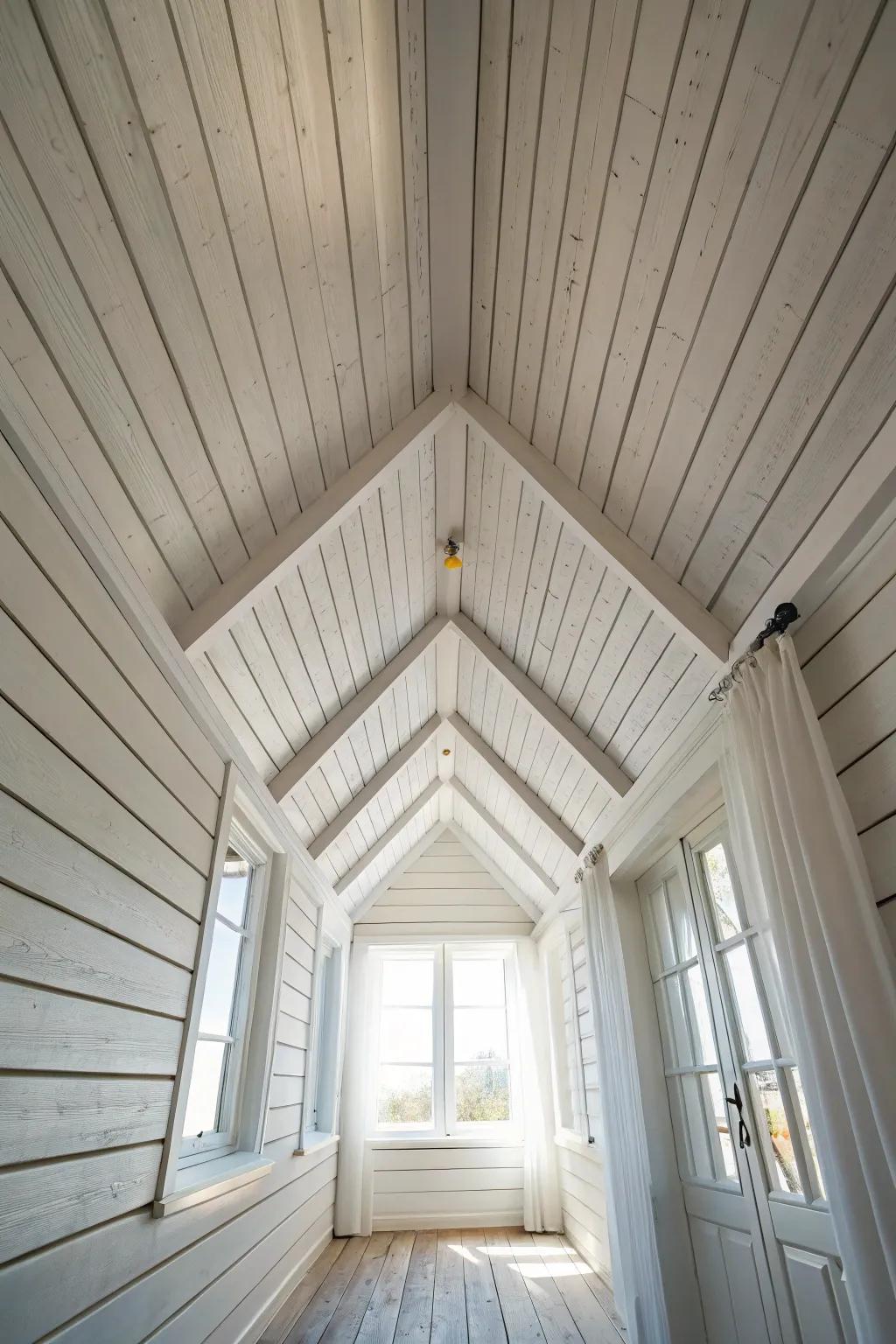 Lengthwise white ceiling planks draw the eye to the window—instant height in low rooms.