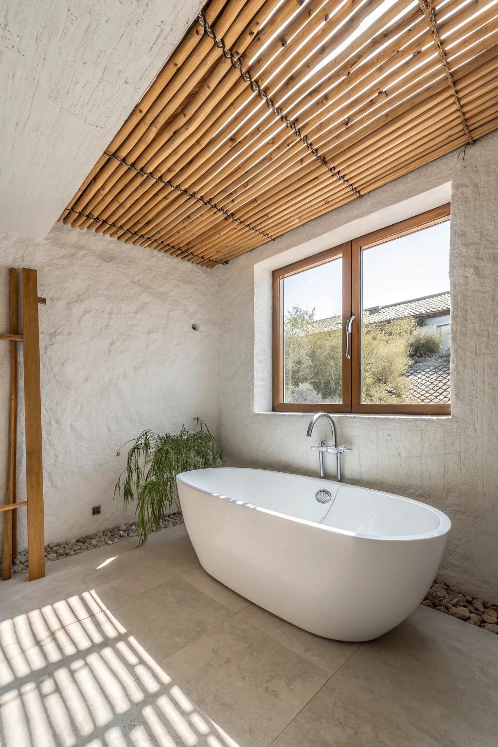 A bamboo slat ceiling panel above the tub adds tropical warmth to a clean white bathroom.