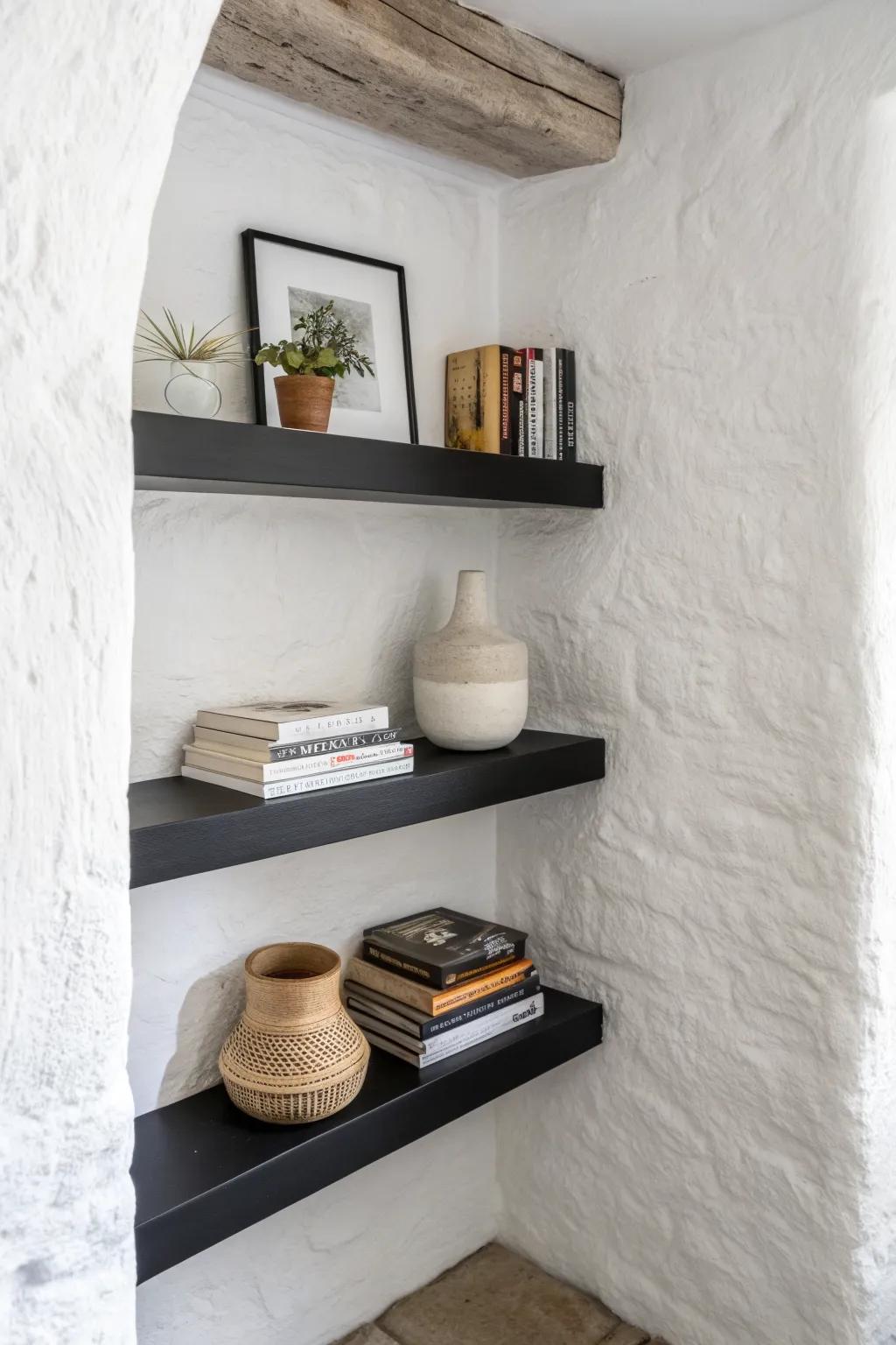 A matte-black wraparound floating shelf that makes a tiny nook feel custom and calm.