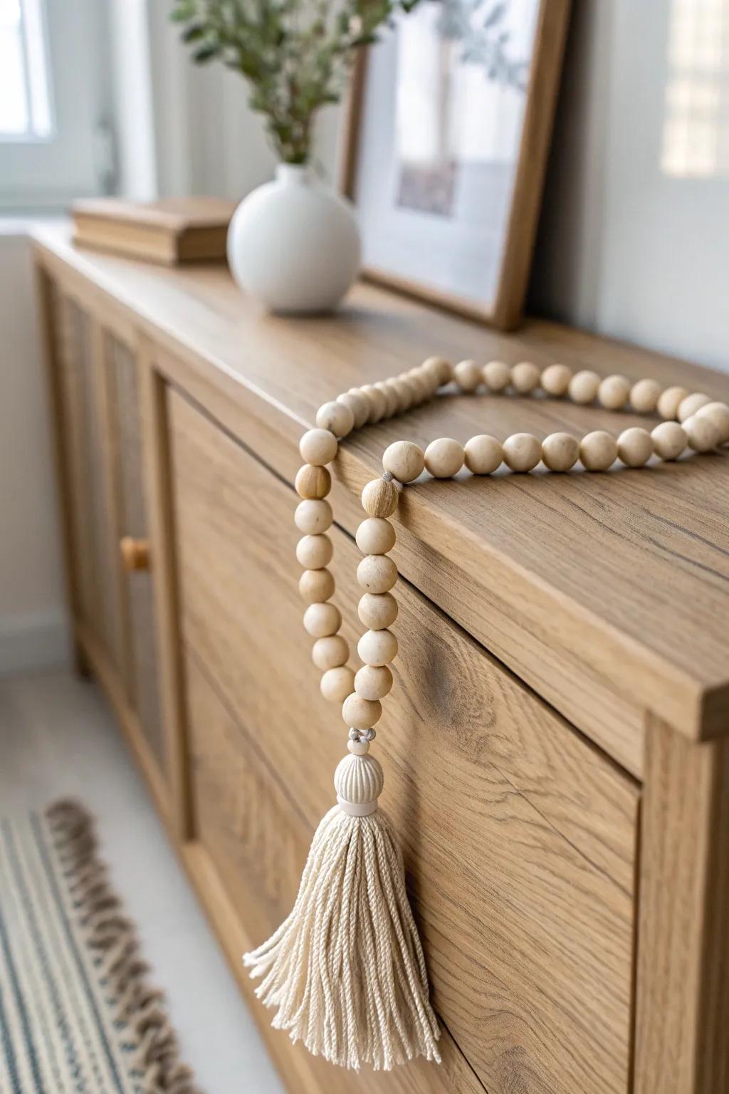 Casual charm in seconds: drape a natural wood bead garland across your buffet.