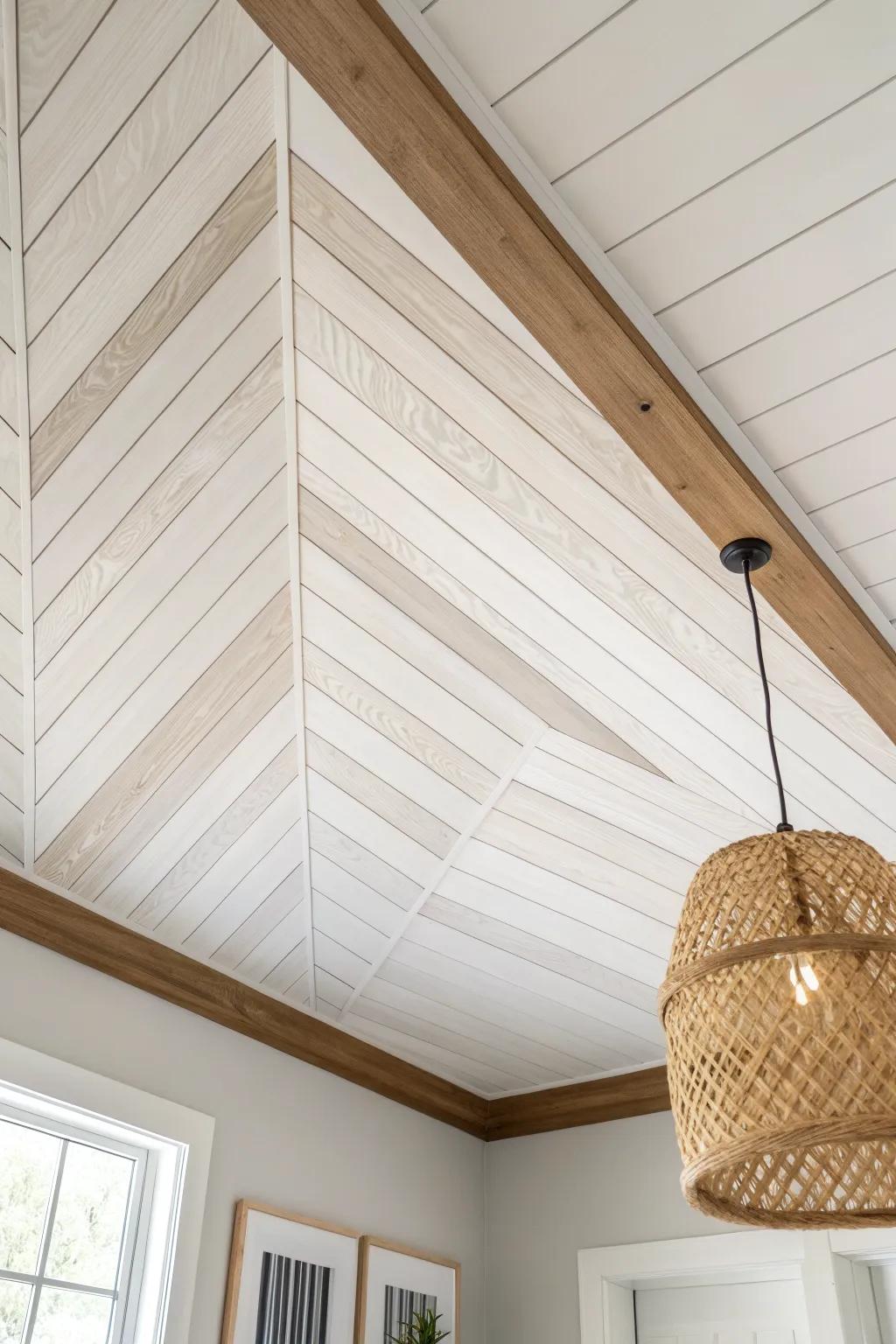Two-tone chevron on painted ceiling planks—simple lines that read like custom millwork.
