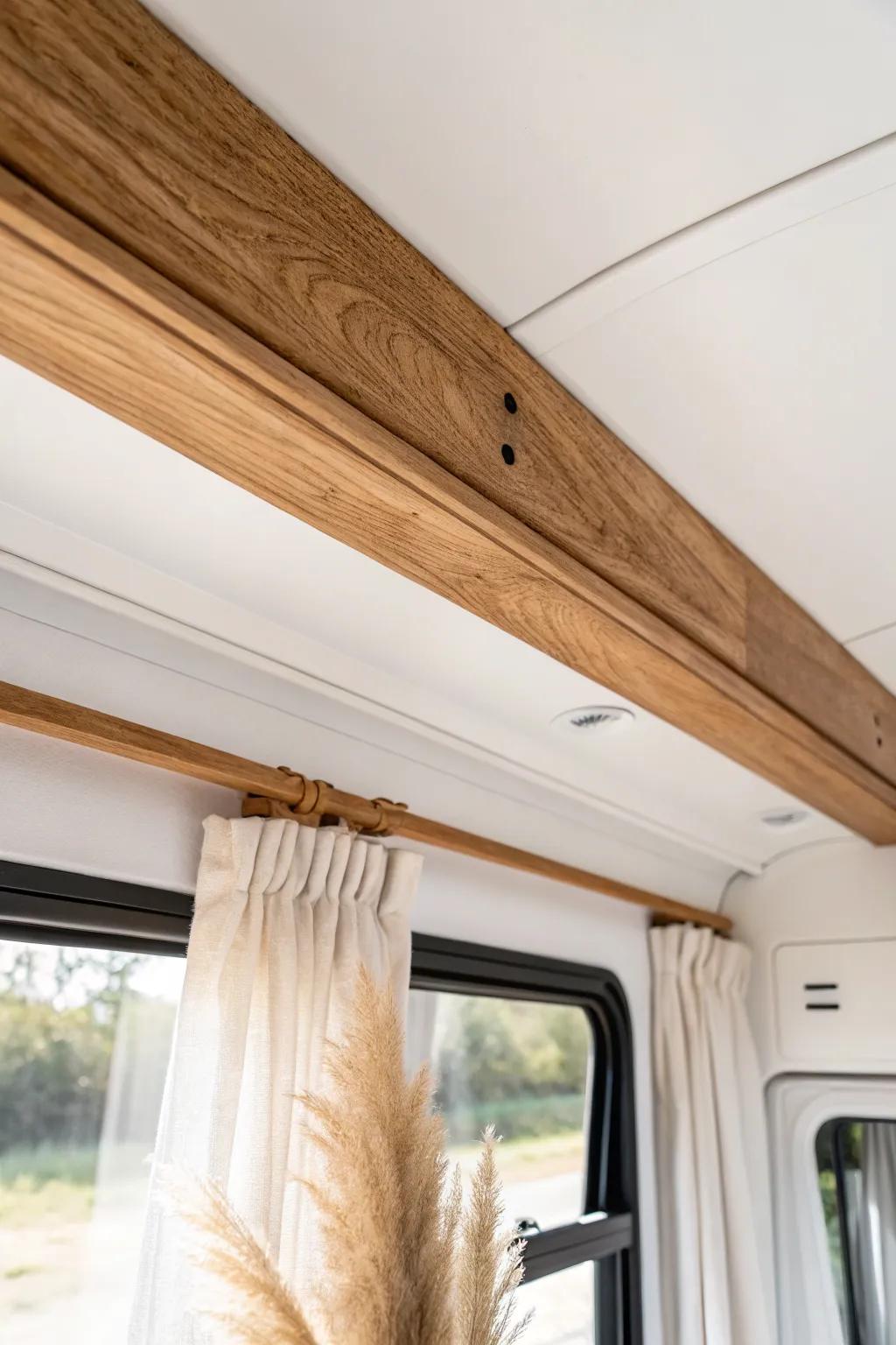Lightweight faux wood beam wrap adds cabin charm—and taller-looking ceilings in a camper.