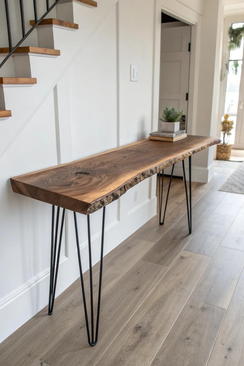 A one-piece live-edge console with sleek legs—raw grain meets clean modern entryway style.