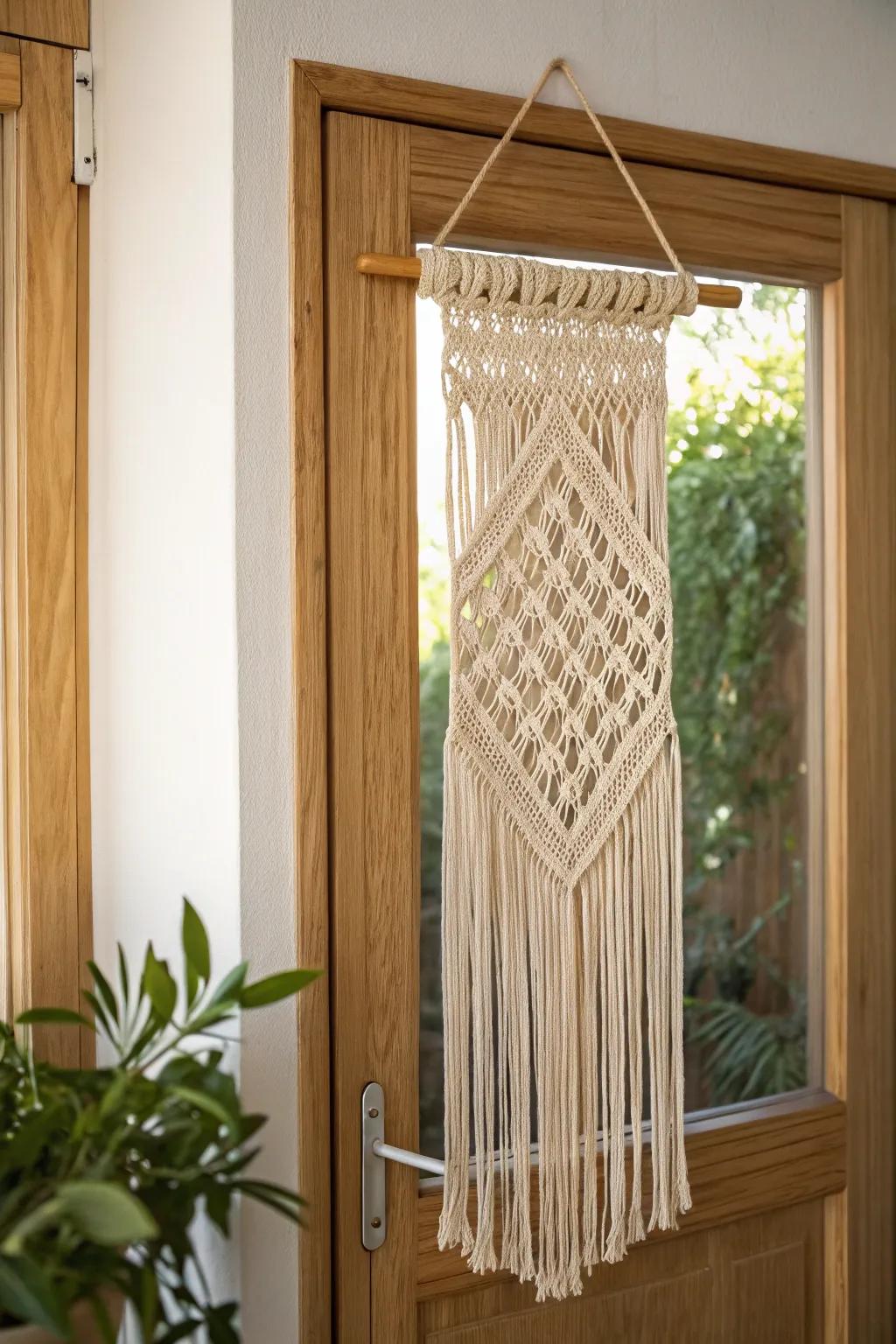A macrame door hanging softens a glass door—airy privacy with beautiful texture and light.