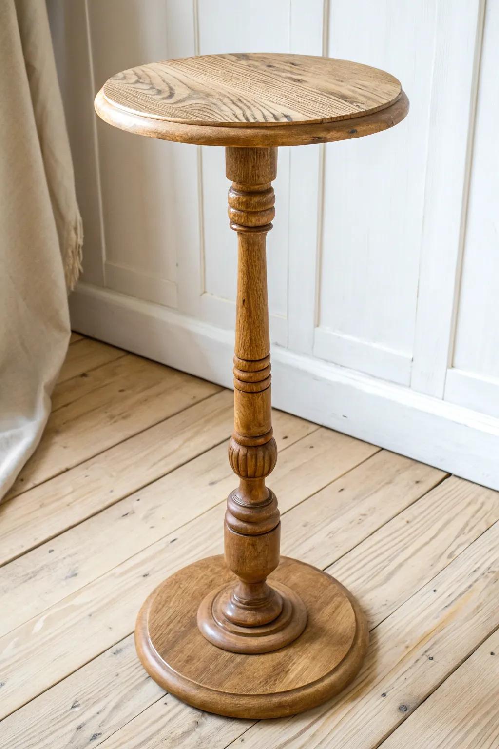 Upcycled stair spindle turned into a petite drink perch—minimal, bold, and beautifully handmade.