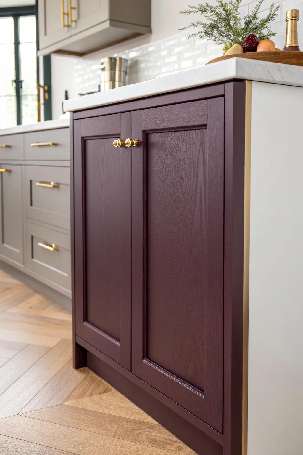 Moody plum cabinets + brass hardware look surprisingly luxe against white and warm wood.
