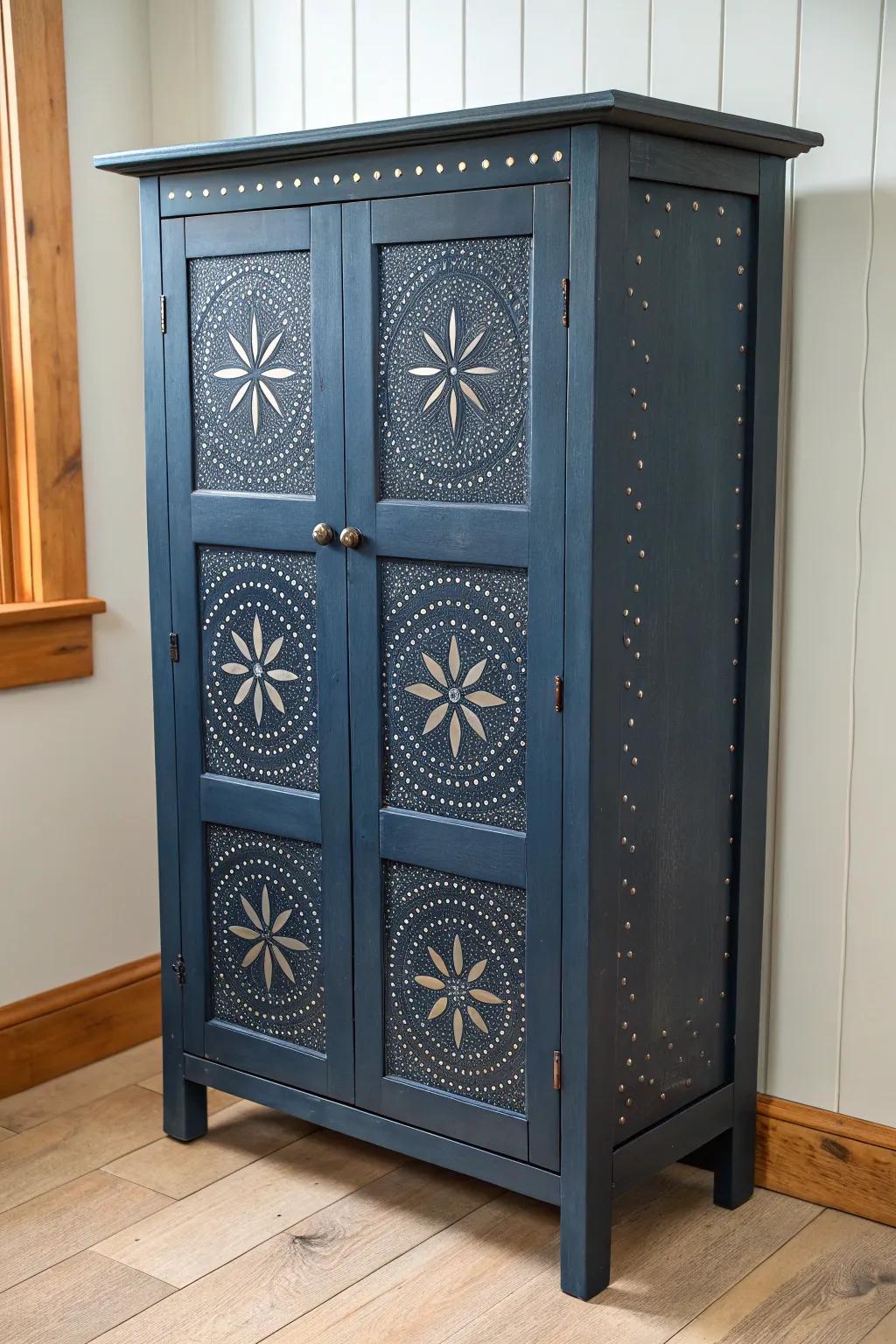 Night-sky navy pie safe with speckled stars and punched-tin panels—vintage, bold, and dreamy.