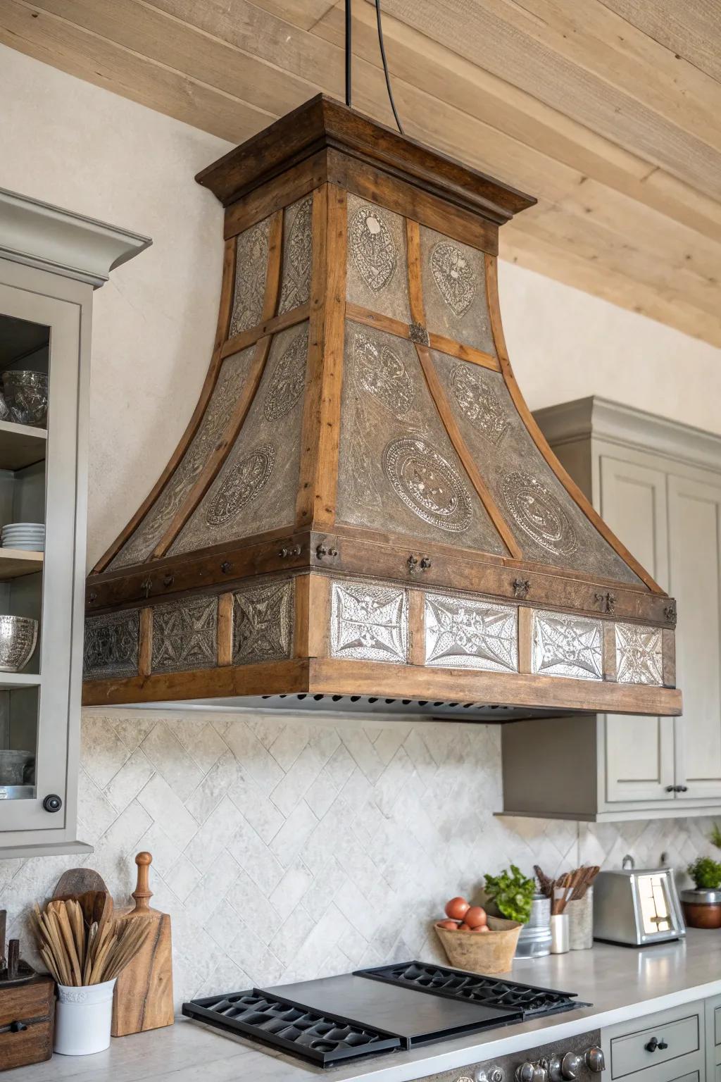 Salvaged tin ceiling tile wrap on a wood hood frame—vintage texture with clean Nordic contrast.