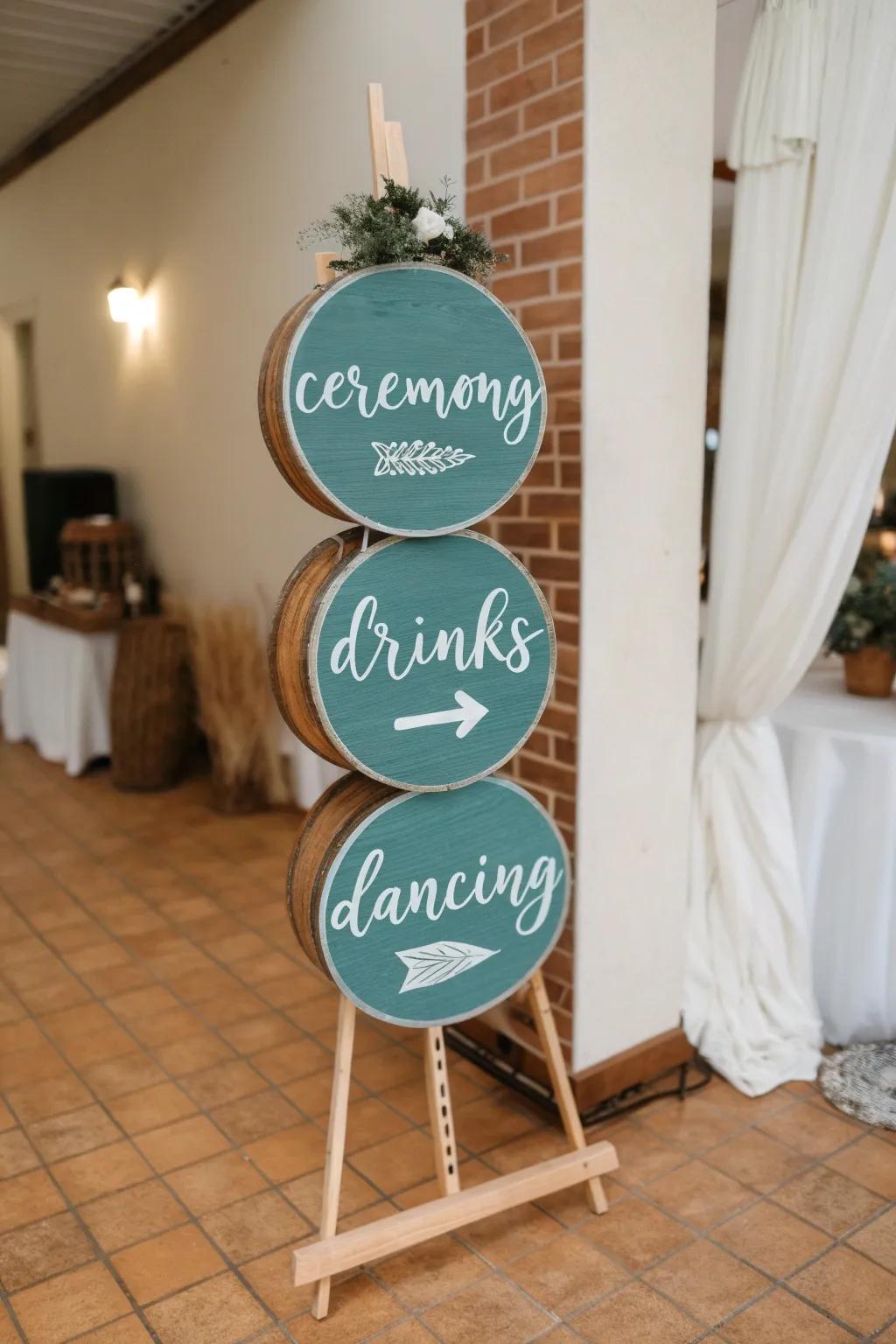 Playful spool-top signage wall—hand-painted circles that guide guests with bold, modern charm.