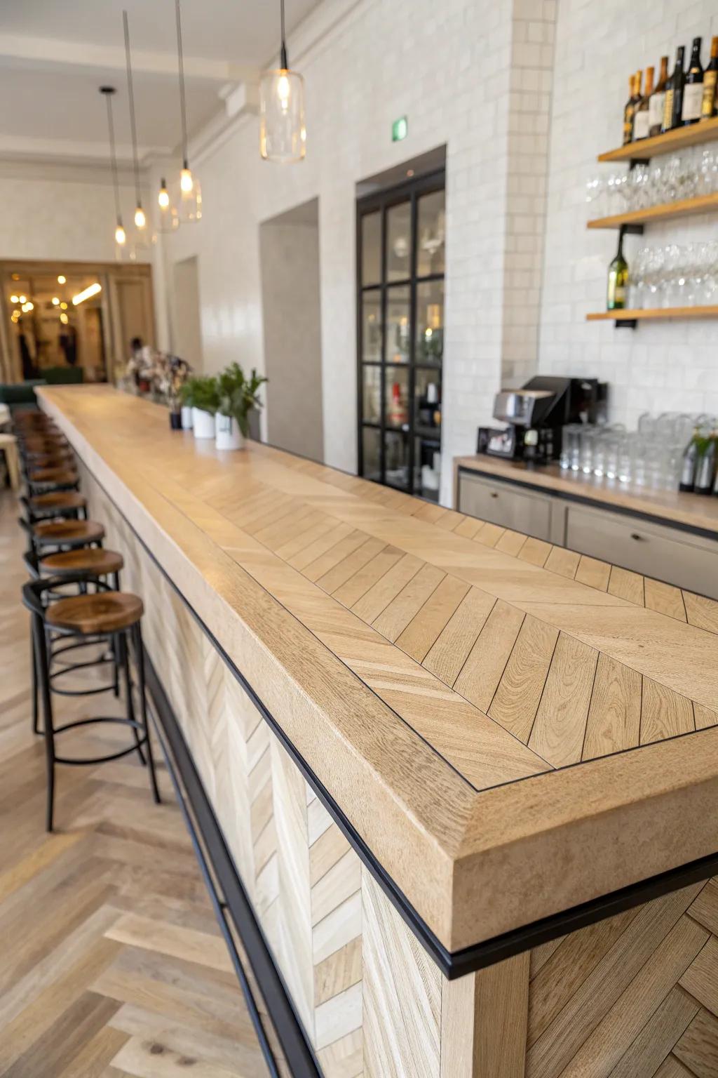 Glassy herringbone parquet bar top—minimal, warm oak craftsmanship that elevates any space.
