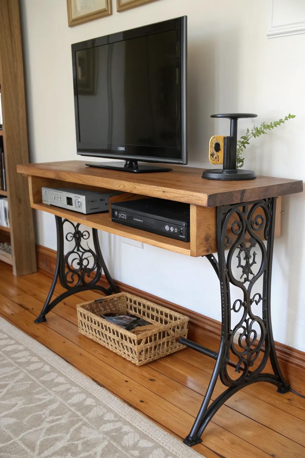 Cast-iron sewing base + thick oak top—an elegant vintage TV stand with timeless character.