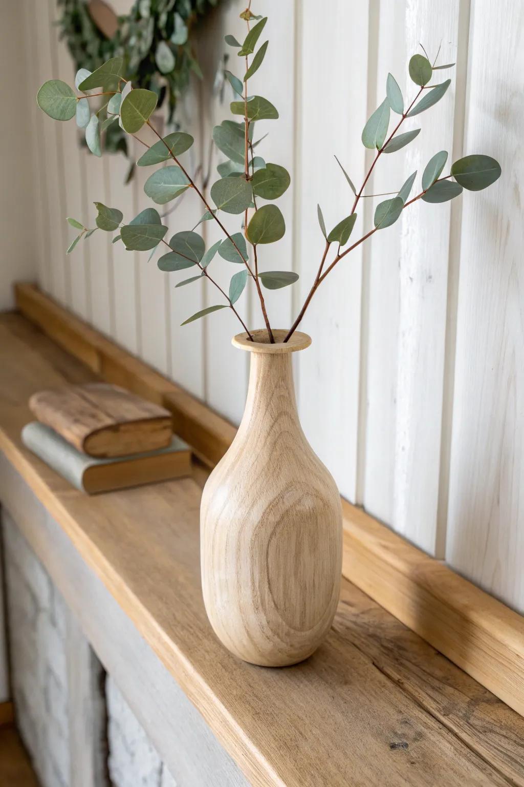 A tiny two-stem ikebana moment—sculptural, calm, and beautifully minimalist on the mantel.