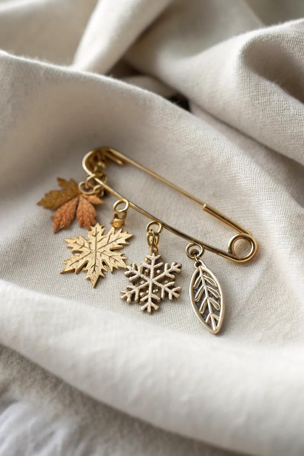 Transform your wardrobe with seasonal safety pin charms, blending simplicity with natural elegance.