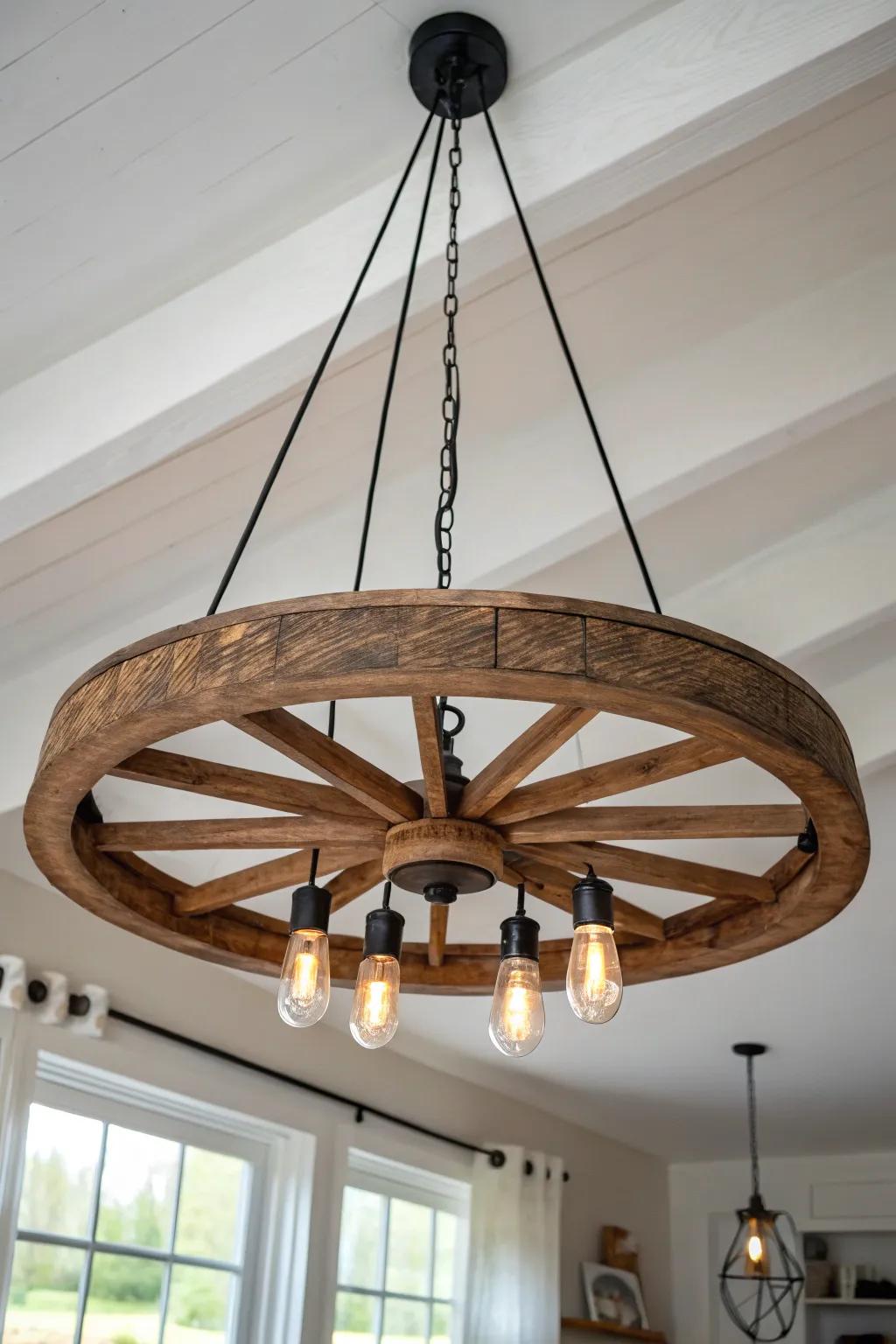 Reclaimed wagon wheel chandelier—warm glow, simple lines, and timeless handmade charm.