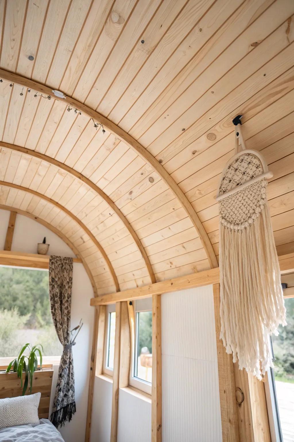 Curved barrel ceilings wrap a tiny nook in warm wood for a custom, cozy cocoon feel.