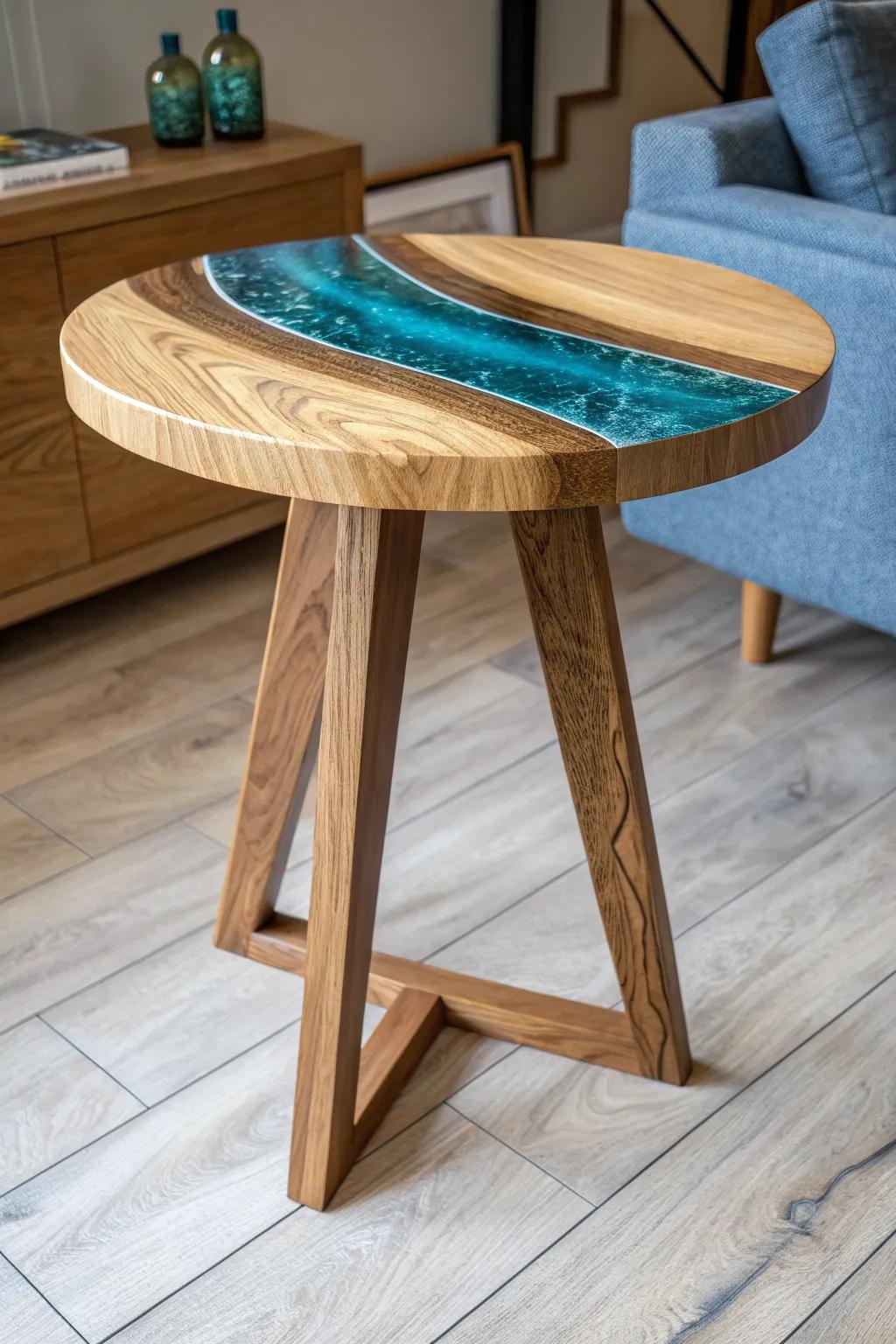 A sleek oak accent table with a bold teal resin inlay—minimal, crafted, and full of shine.