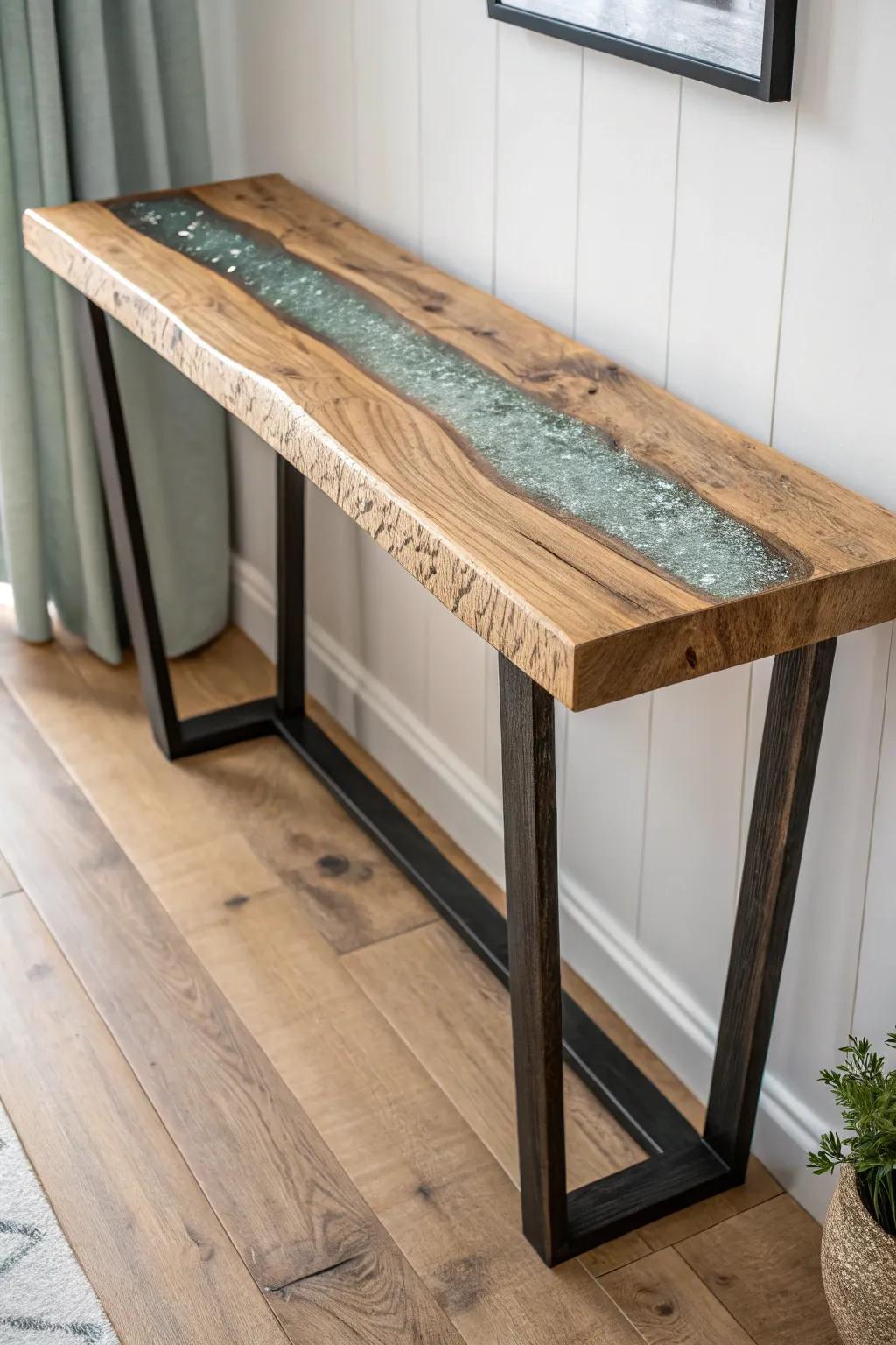 Rustic meets modern: reclaimed wood console with a crystal-clear resin river centerpiece.