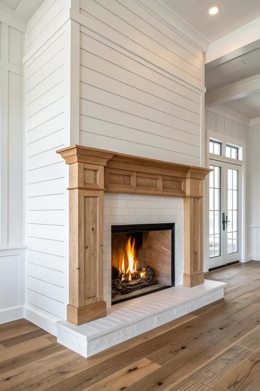 Classic white shiplap bump out with a chunky knotted oak mantel—simple, warm, timeless.