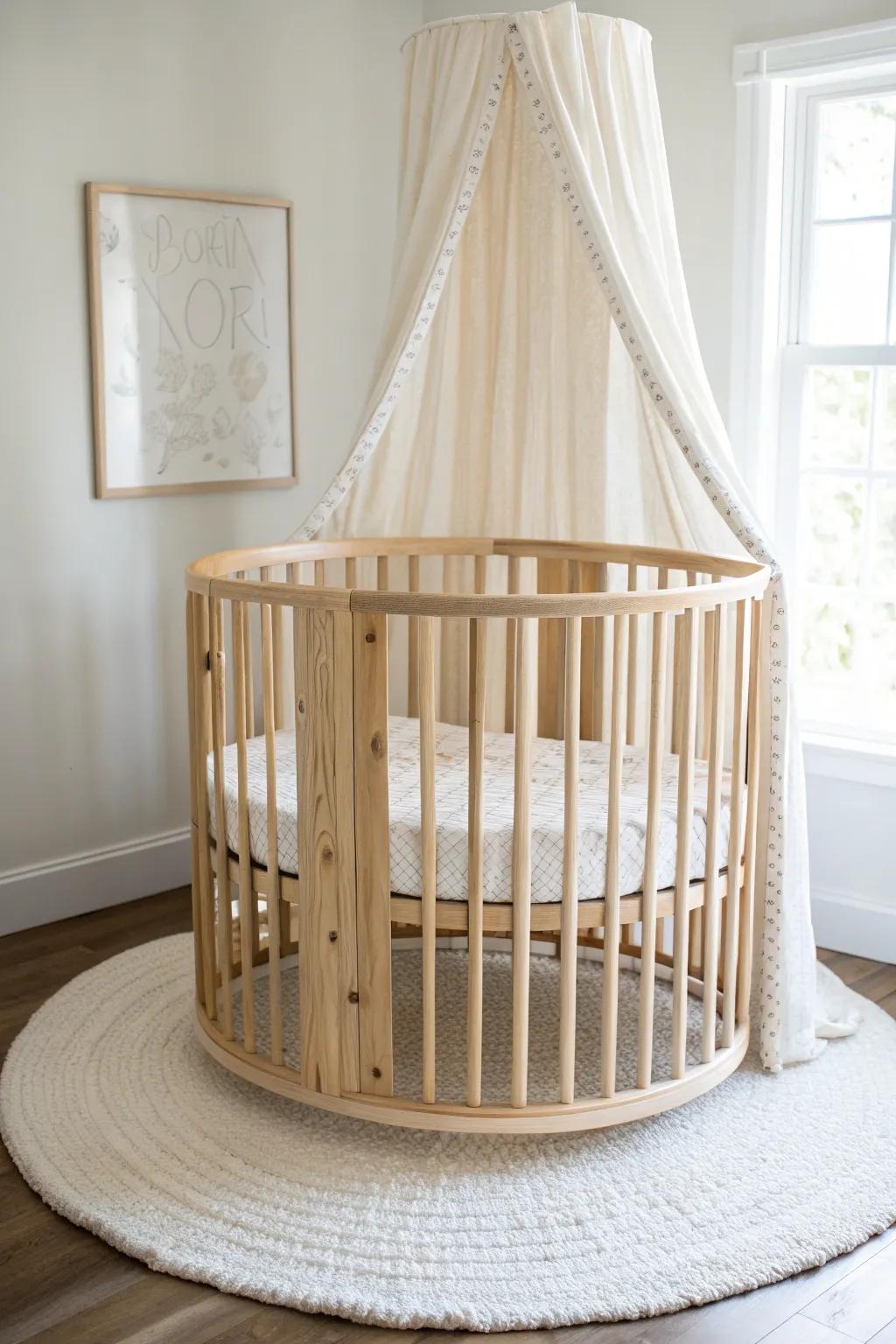 Neutral nursery perfection: a pale wood round crib with creamy linens and calming grain.