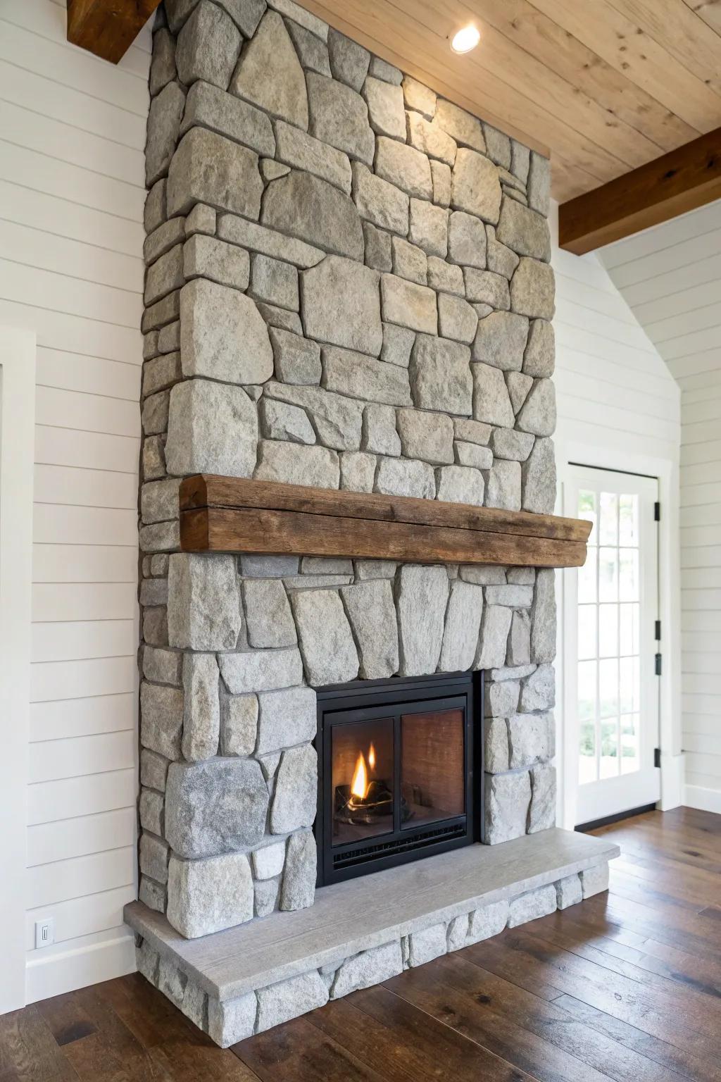 Rugged stone meets warm oak—this fireplace focal wall instantly grounds a rustic, cozy den.