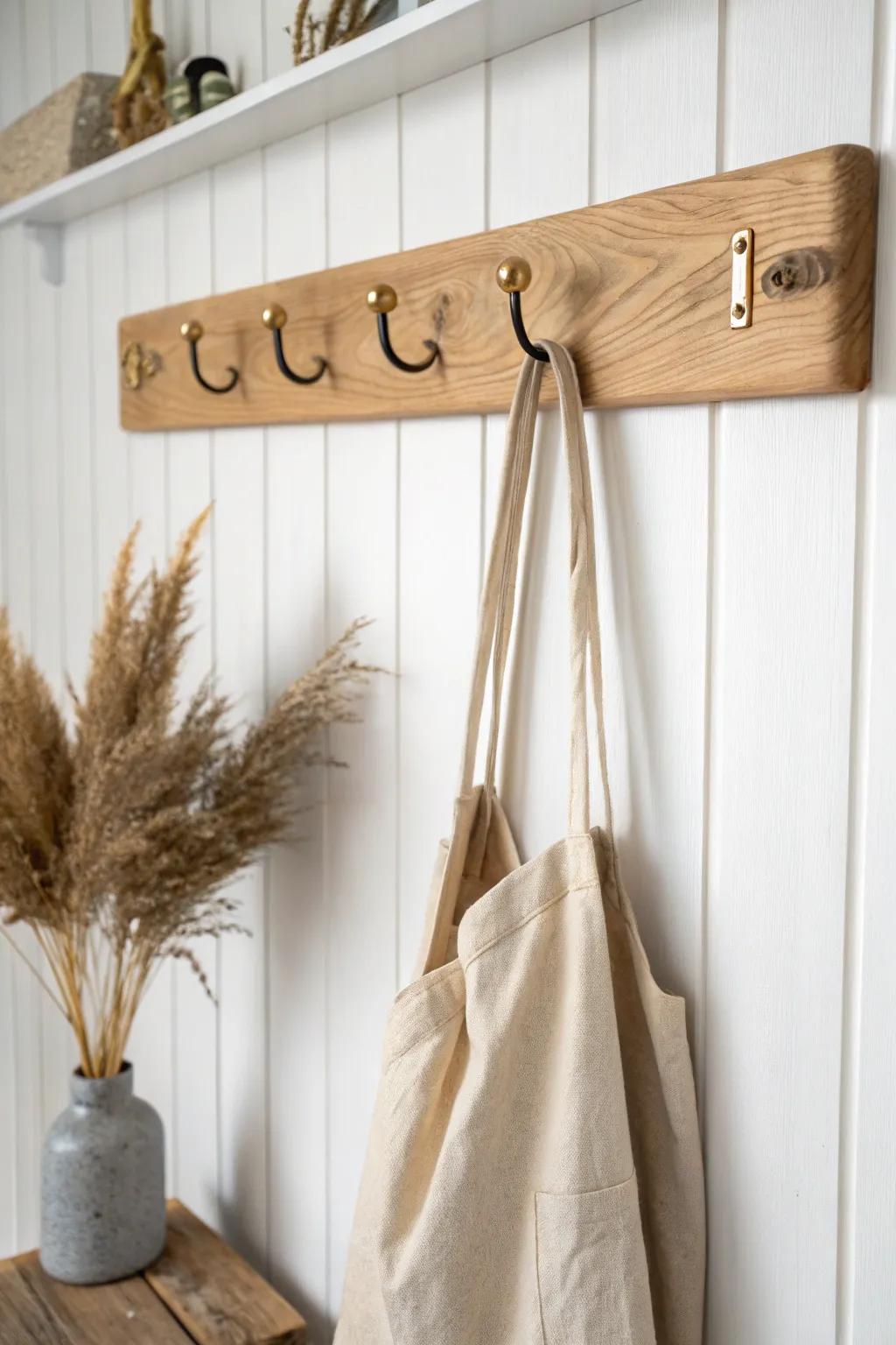 A simple oak hook rail turns a small breezeway into a calm, quick drop zone.