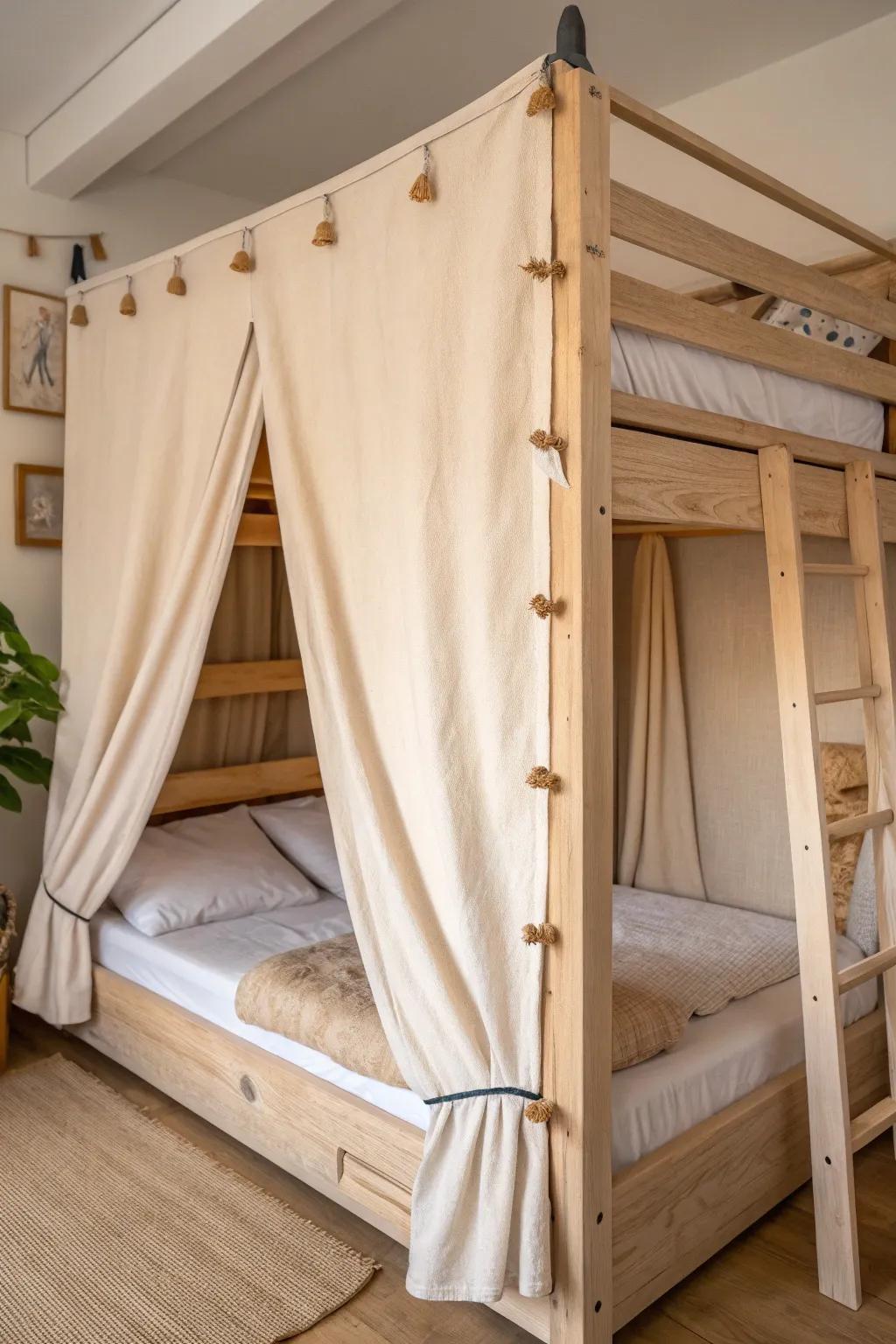 Wraparound linen canopy turns the top bunk into a snug fort—tie back with wooden toggles.