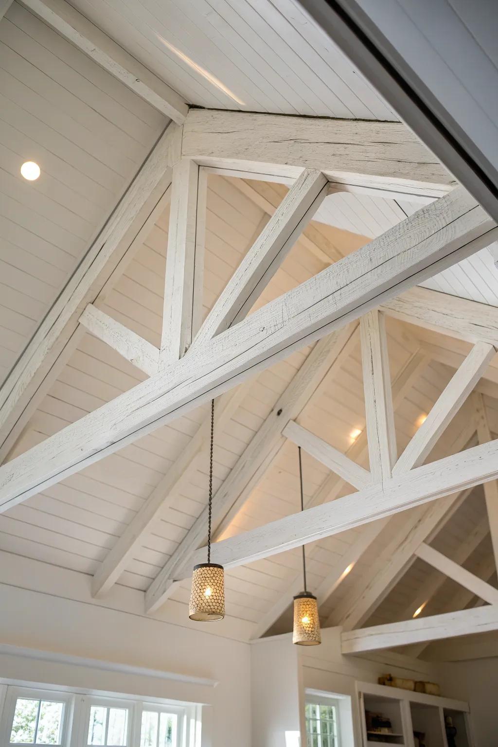 All-white painted trusses: airy farmhouse texture with crisp lines and cozy evening glow.