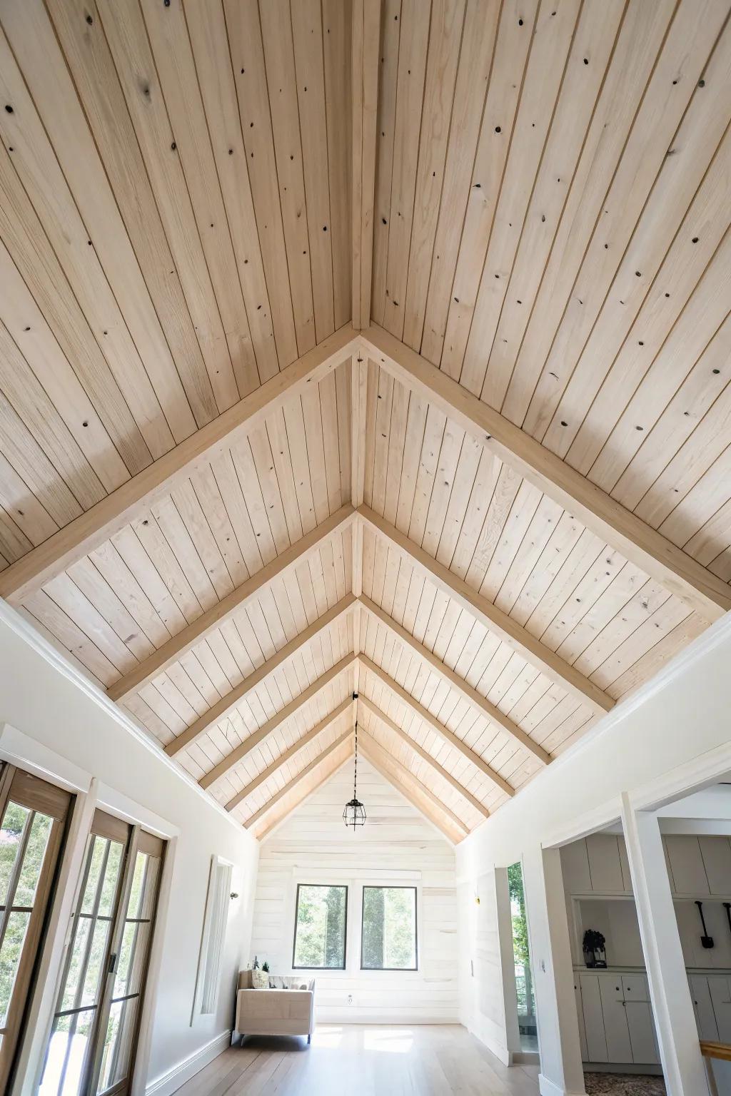Tongue-and-groove planks wrap this vaulted ceiling in warm wood—simple, cozy, serene.