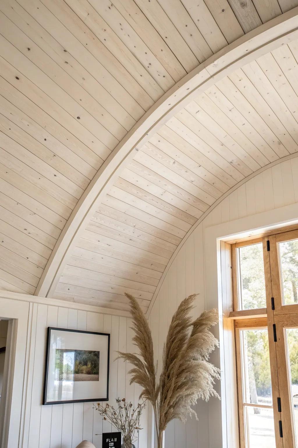 Soft-curve shiplap arch in pale pine—farmhouse warmth with clean Scandinavian contrast.