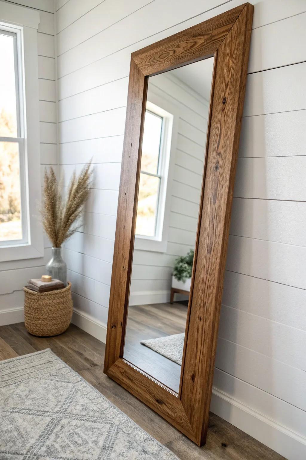 Chunky wood-framed mirror in a warm stain—simple, modern farmhouse charm with artisan detail.