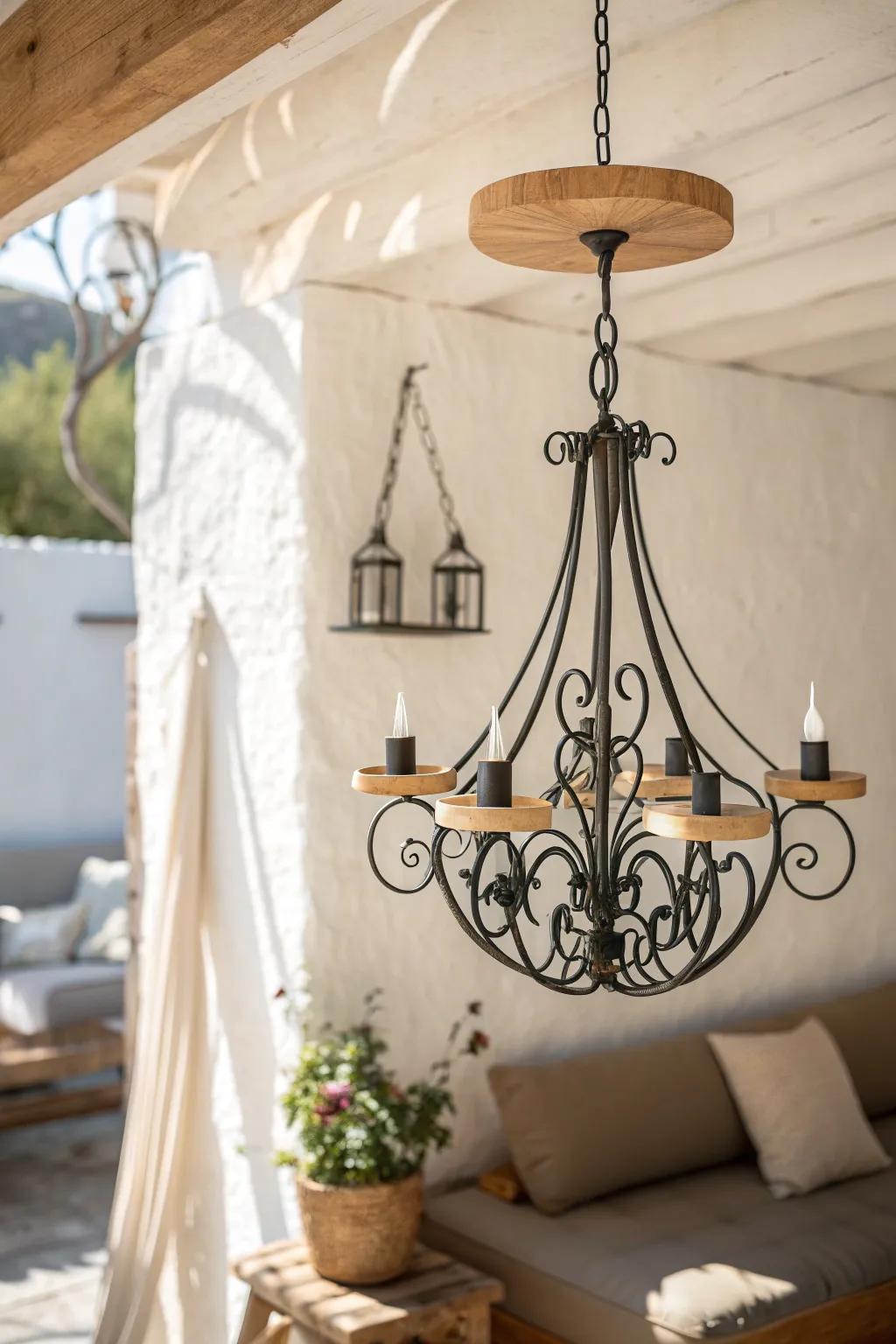 An airy wrought-iron chandelier brings Tuscan charm—warm and cozy, never heavy.