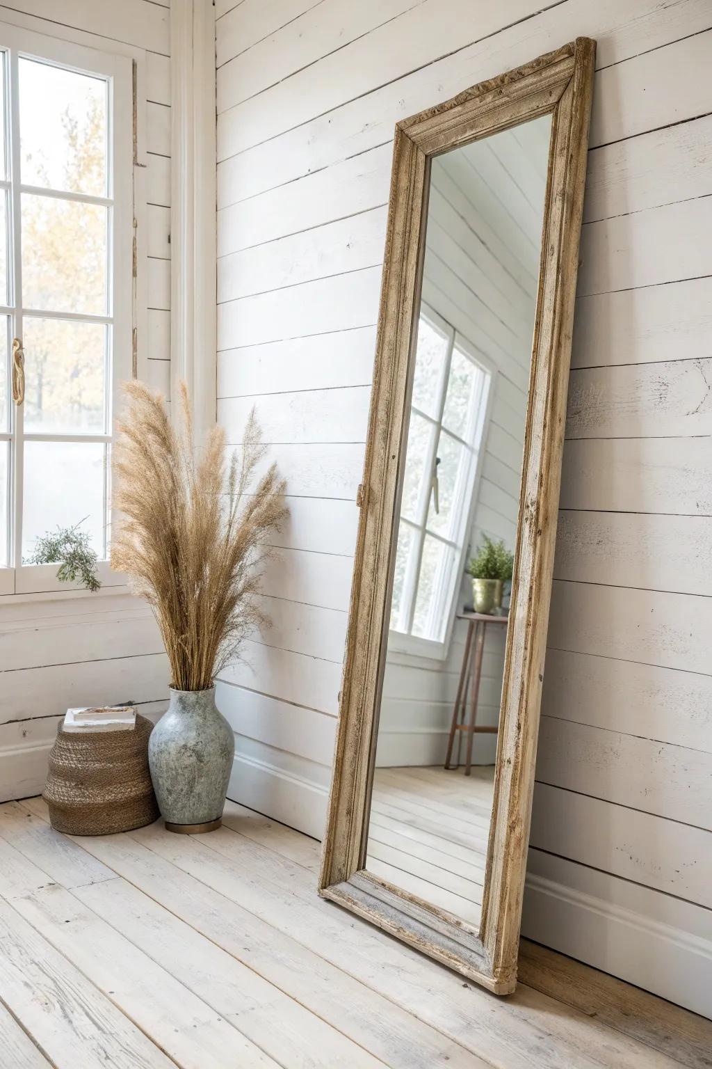 Layer vintage mirrors in tight booths to bounce light and double your prettiest vignette.