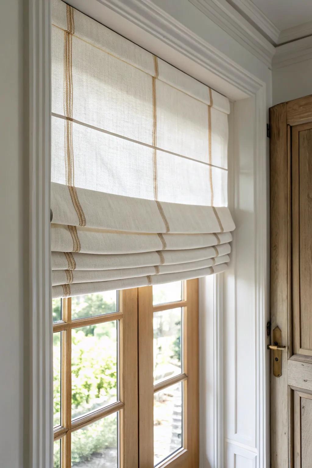 Crisp-fold flat Roman shade for French doors—soft linen texture with clean, modern lines.