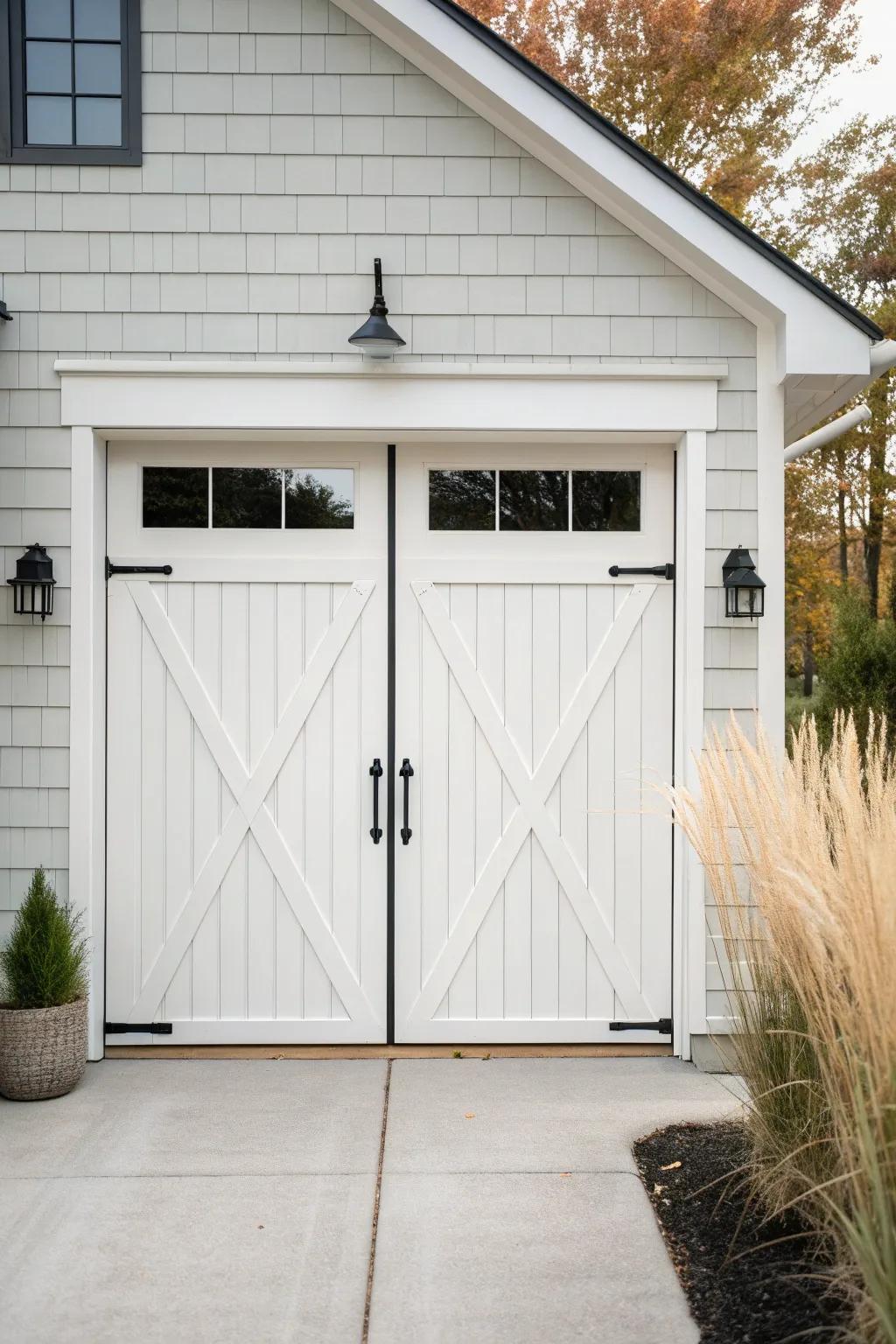 Crisp white barn doors + chunky black hardware—modern farmhouse contrast made timeless.