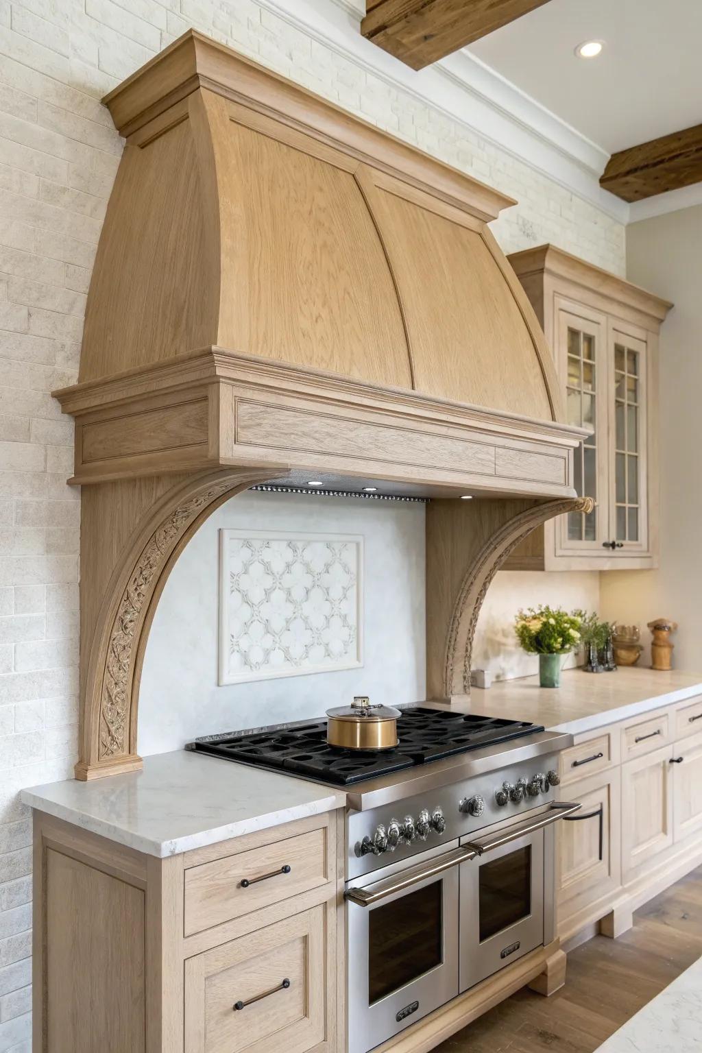 Arched oak range hood niche with simple trim—an instant old-world hearth focal point.