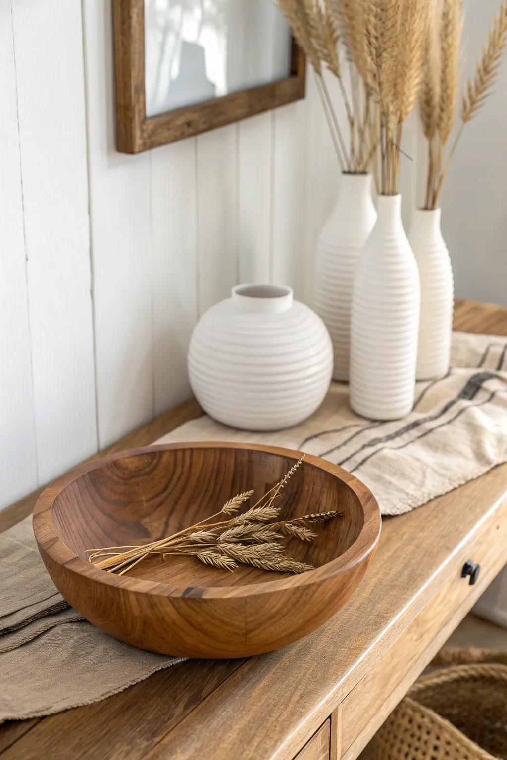 Warm wood grain meets matte white ceramics—an easy, cozy console table styling combo.