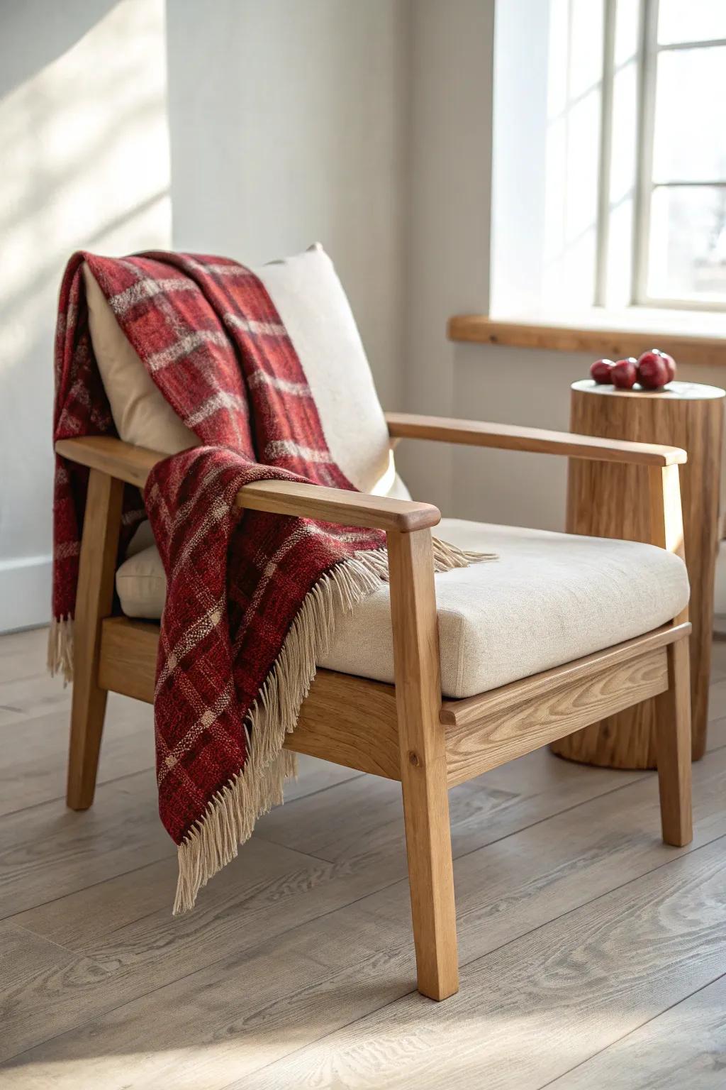 A red-and-cream plaid throw on a wooden chair instantly adds cottage Christmas warmth.