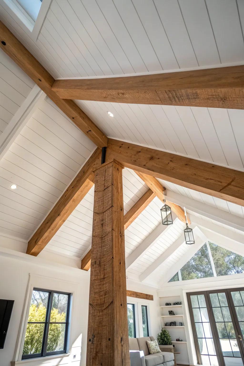 A chunky ridge beam turns a vaulted family room ceiling into a warm, intentional focal point.
